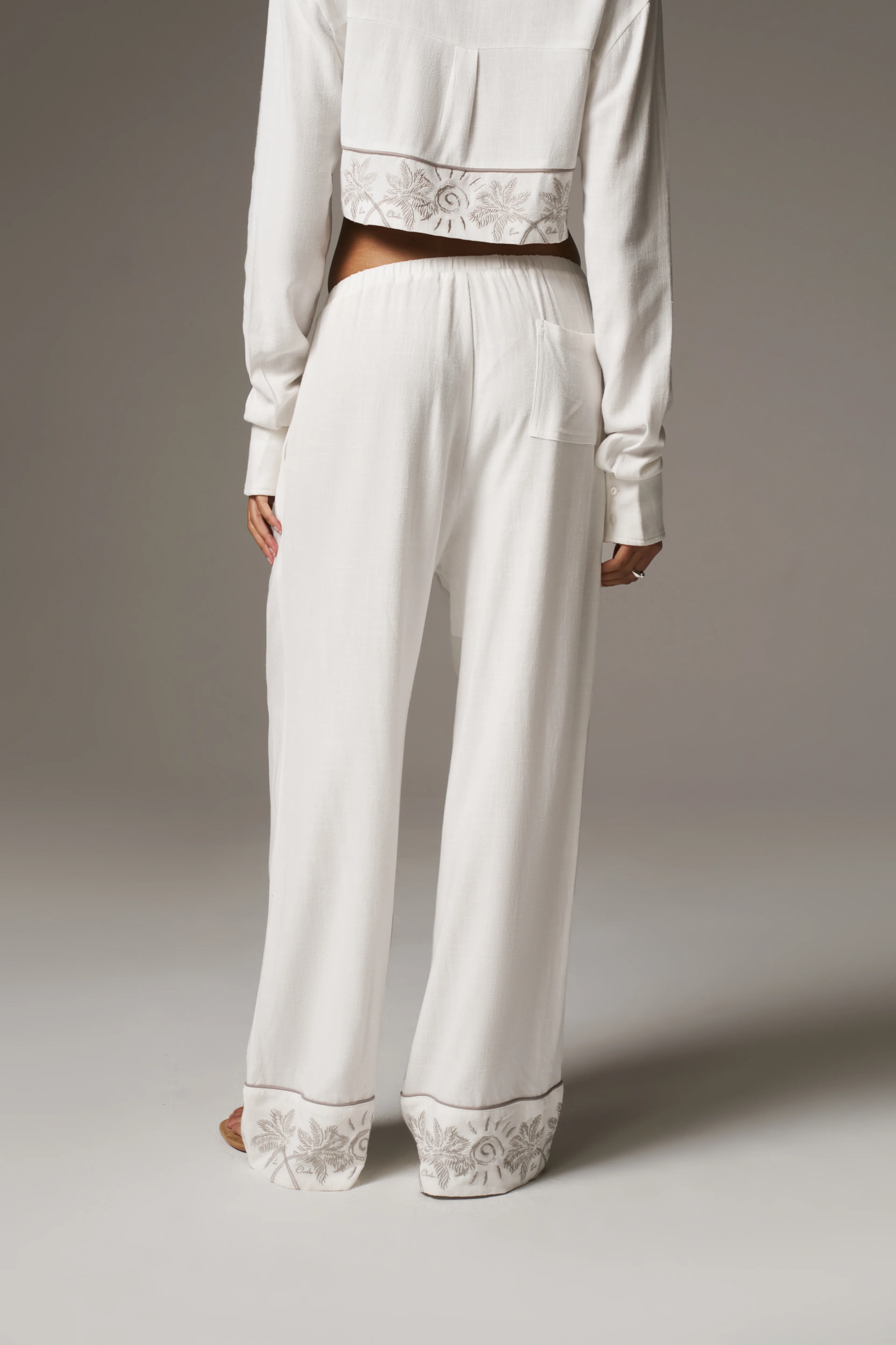 PALM EMBROIDERED WIDE LEG TROUSERS - OFF WHITE