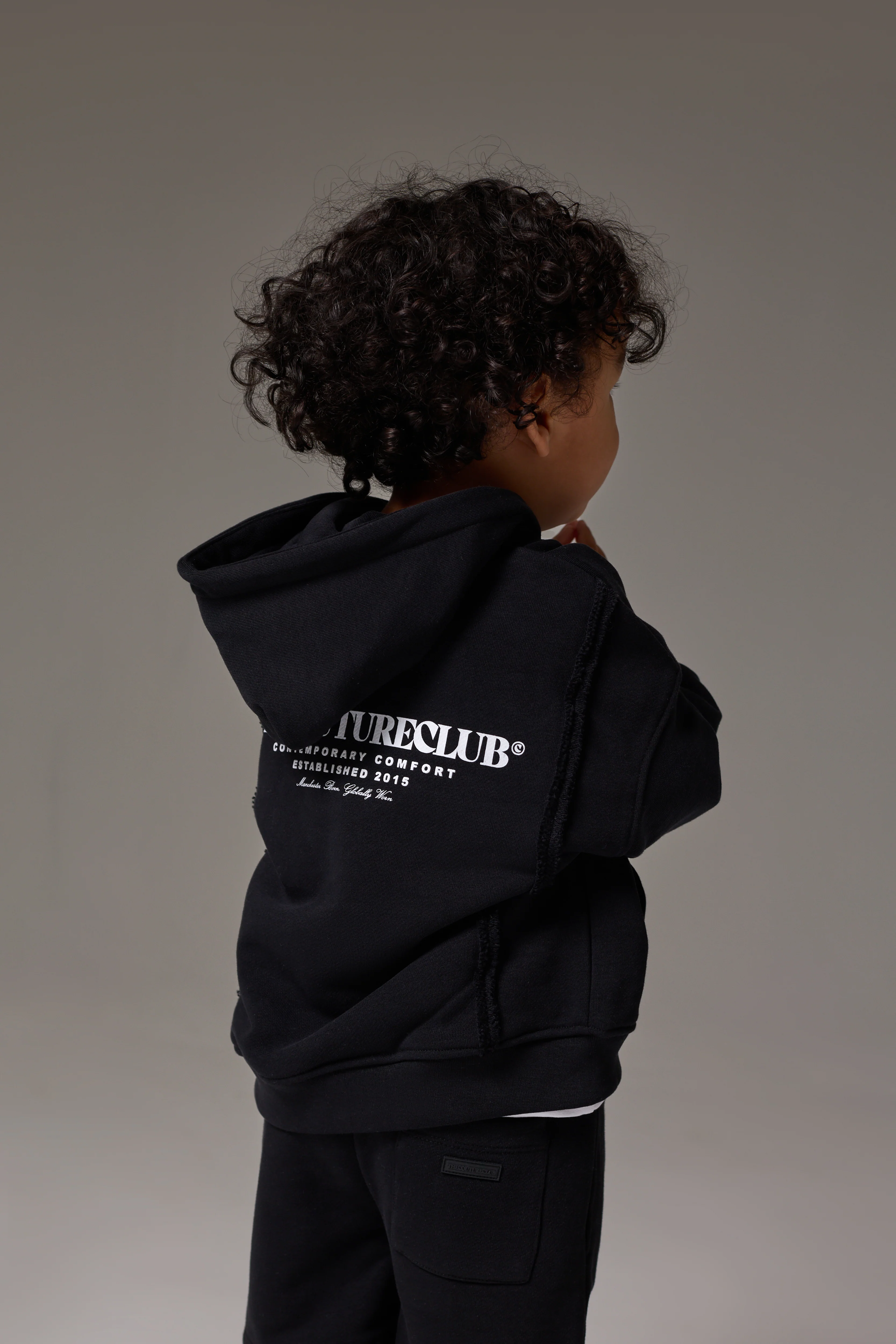 KIDS COPYRIGHT ZIP THROUGH HOODIE - BLACK