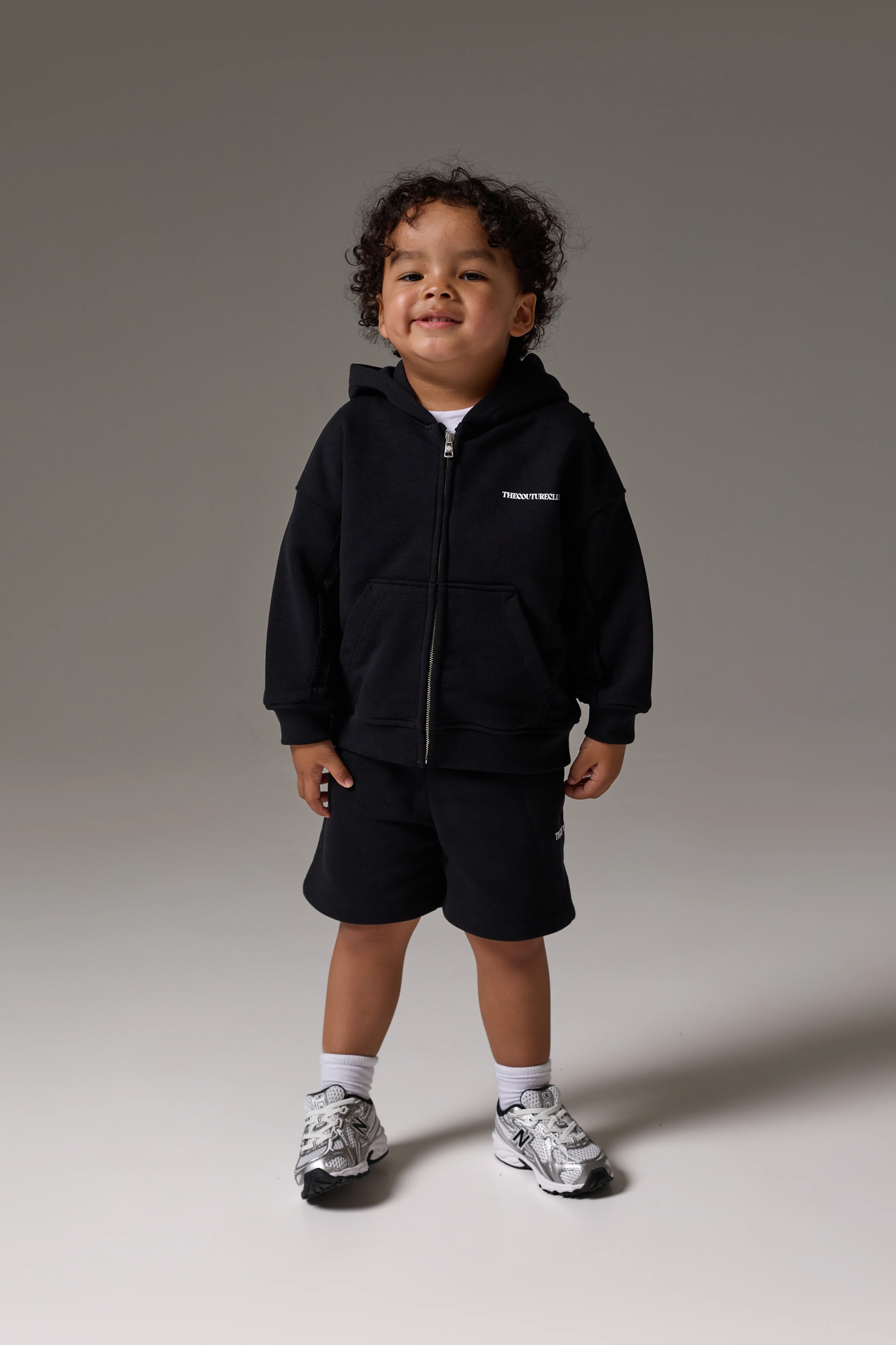 KIDS COPYRIGHT ZIP THROUGH HOODIE - BLACK