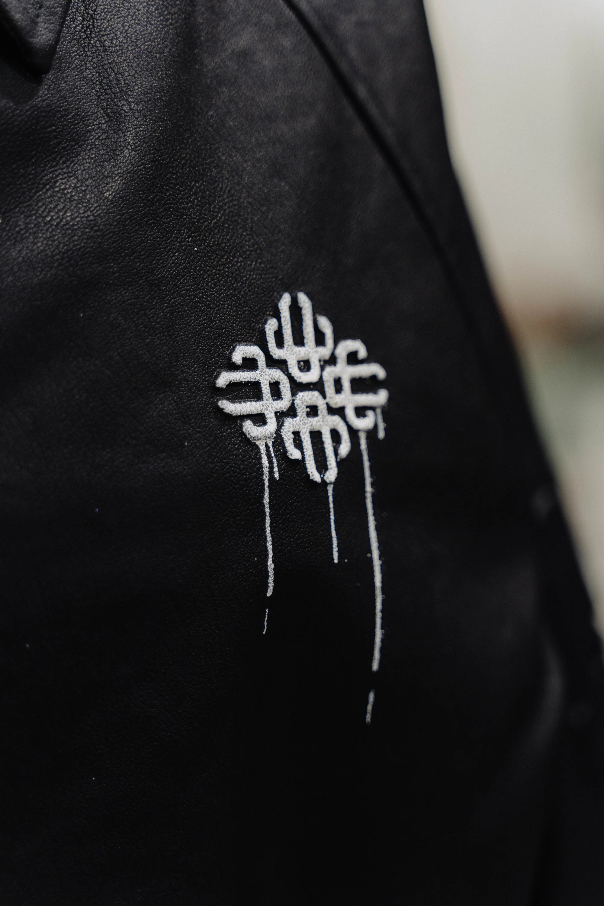 BOOGIE EMBOSSED BOMBER JACKET - BLACK