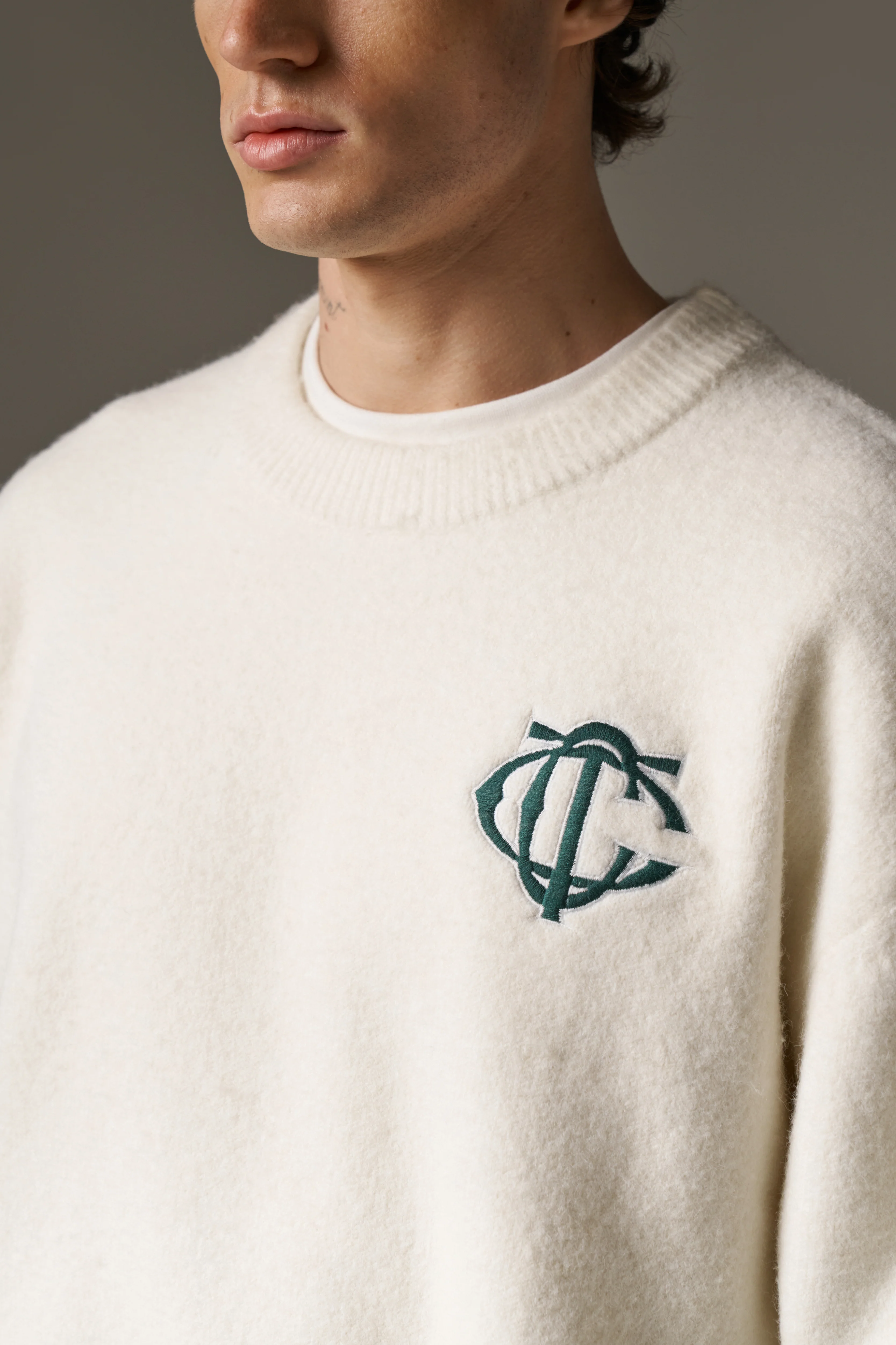 MONOGRAM EMBLEM KNITTED CREW - OFF WHITE