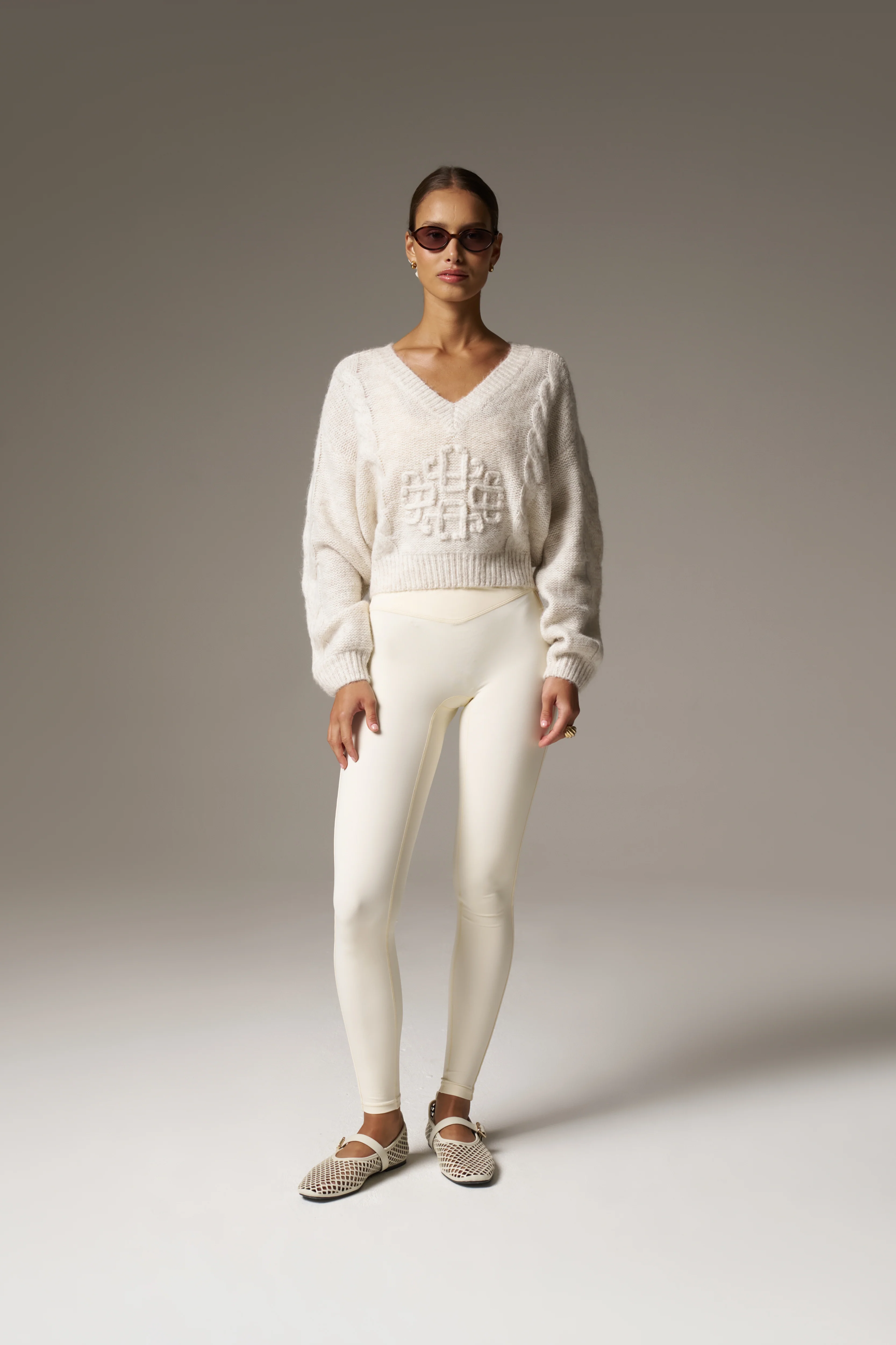 EMBLEM KNITTED V NECK JUMPER - BEIGE