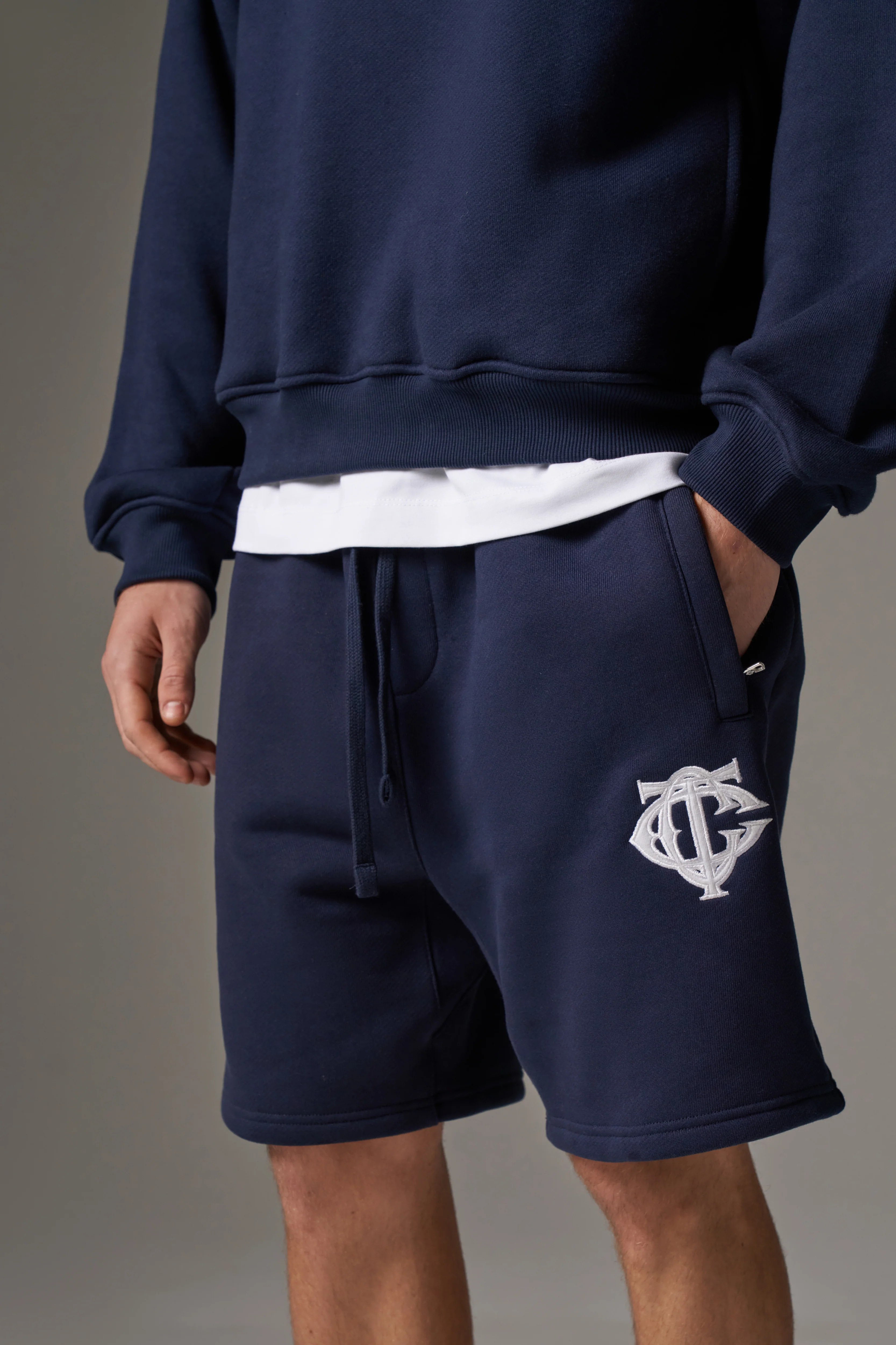 HEAVYWEIGHT MONOGRAM EMBLEM SHORTS - NAVY