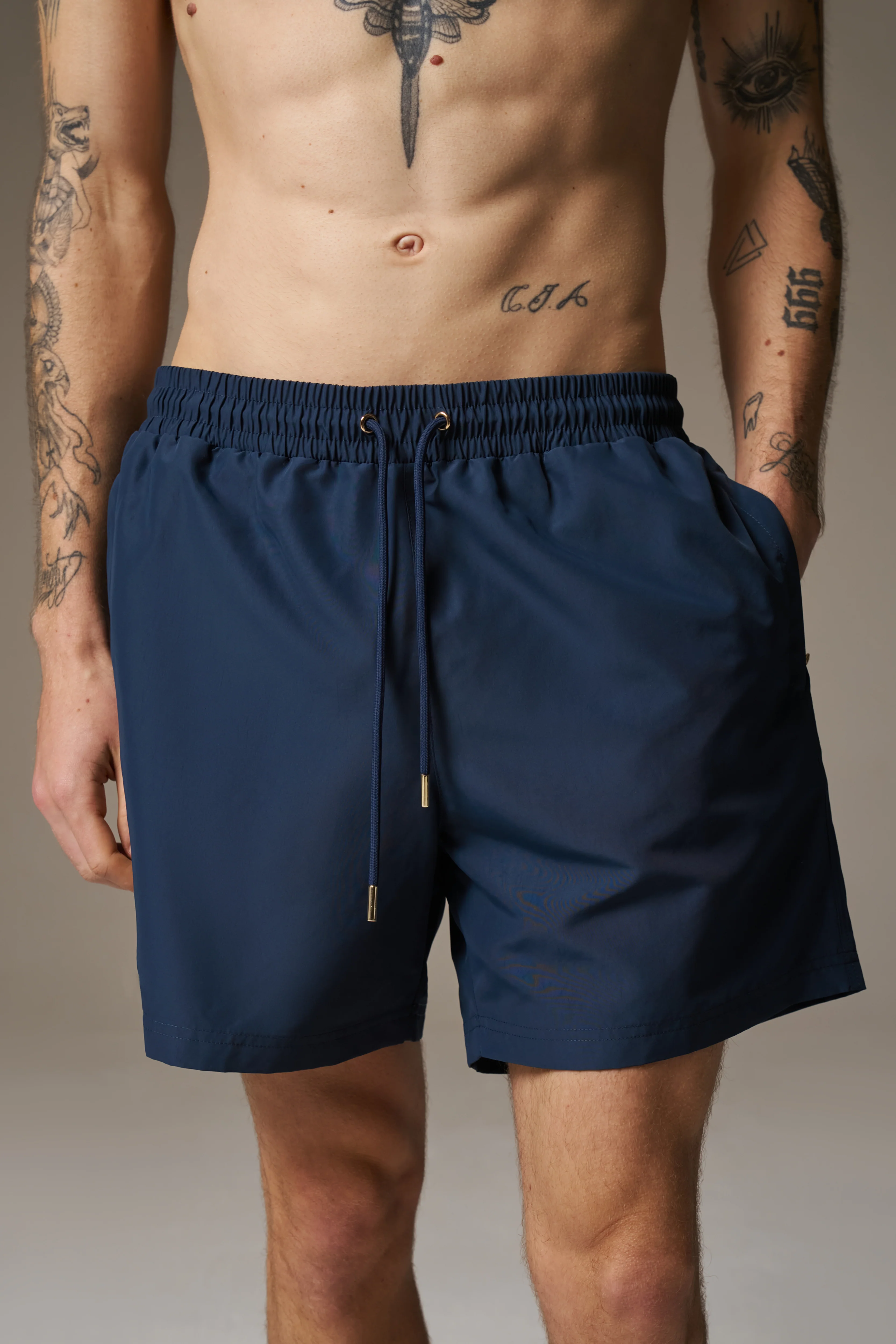 WATER REACTIVE EMBLEM SWIM SHORT - NAVY
