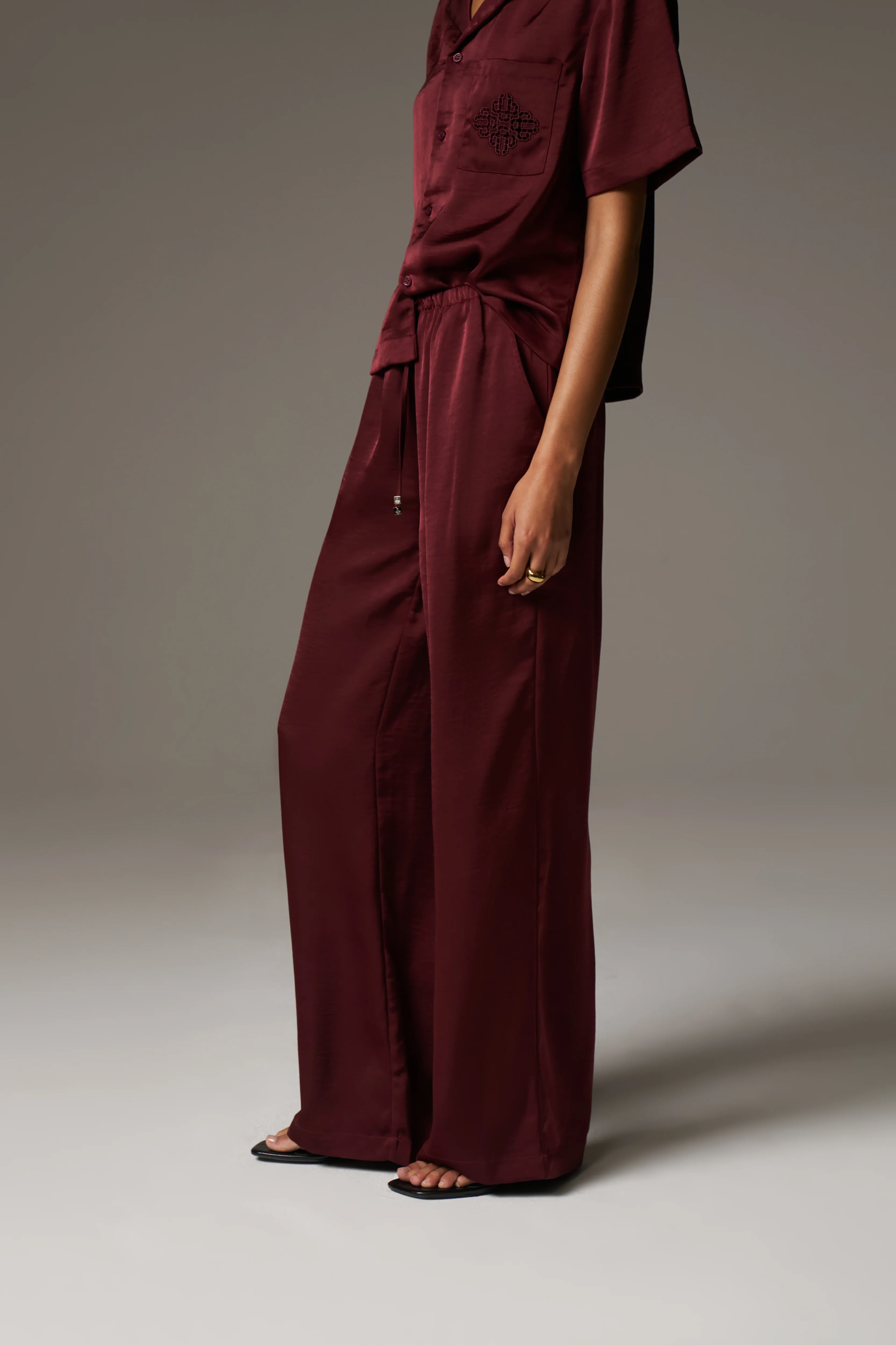 SATIN WIDE LEG EMBLEM TROUSERS - BURGUNDY