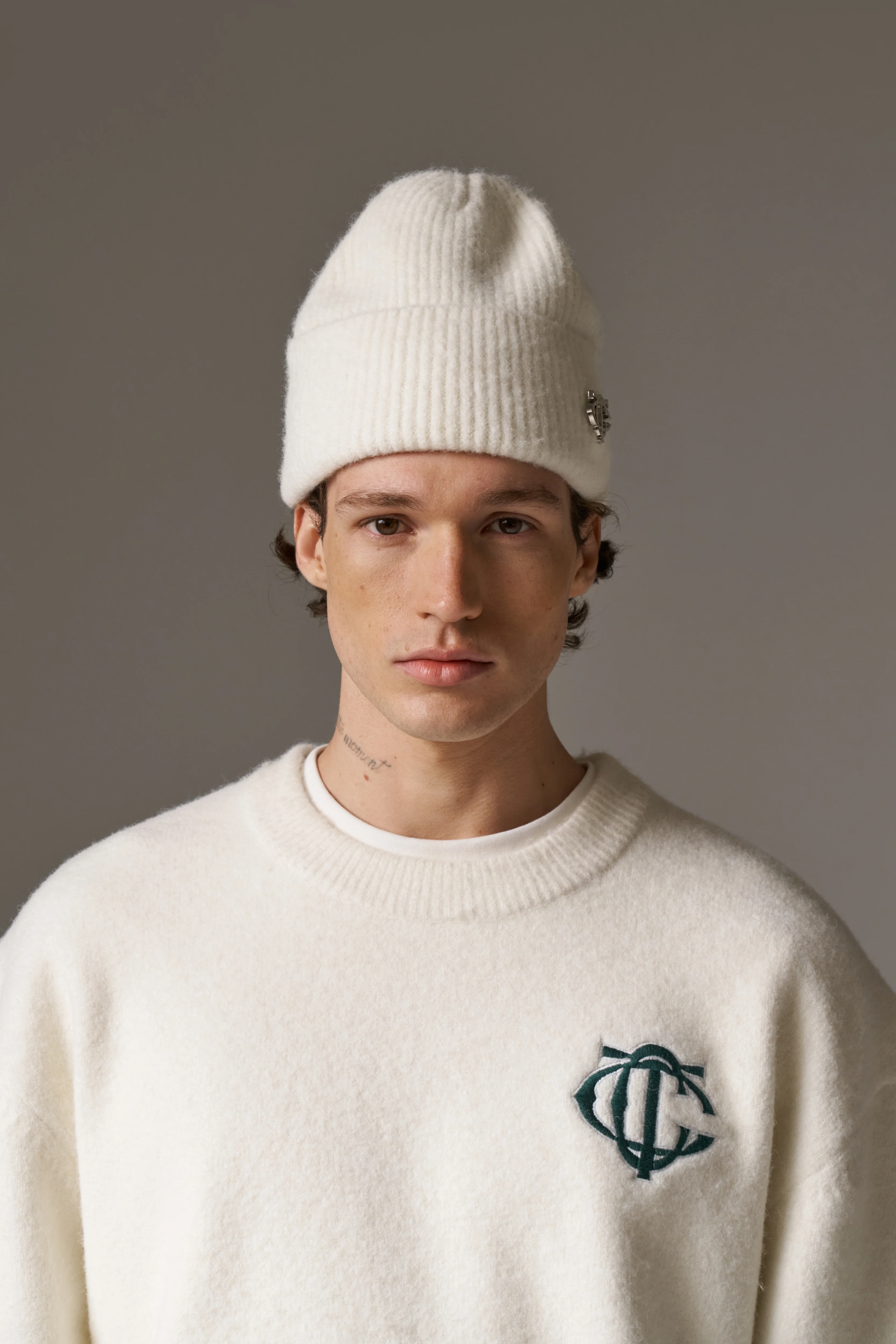 FLUFFY KNIT MONOGRAM PIN BADGE BEANIE - OFF WHITE