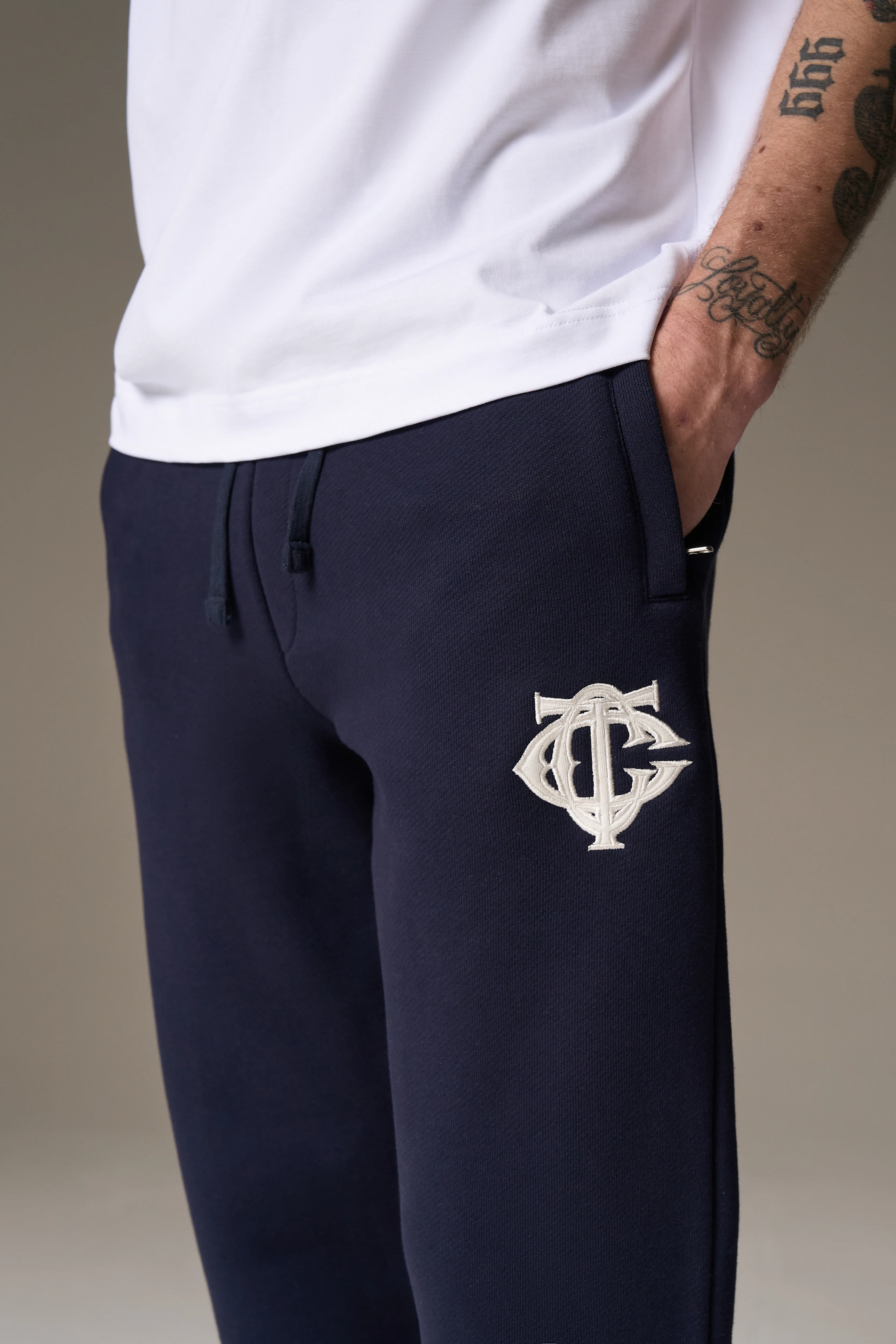 HEAVYWEIGHT MONOGRAM EMBLEM JOGGERS - NAVY
