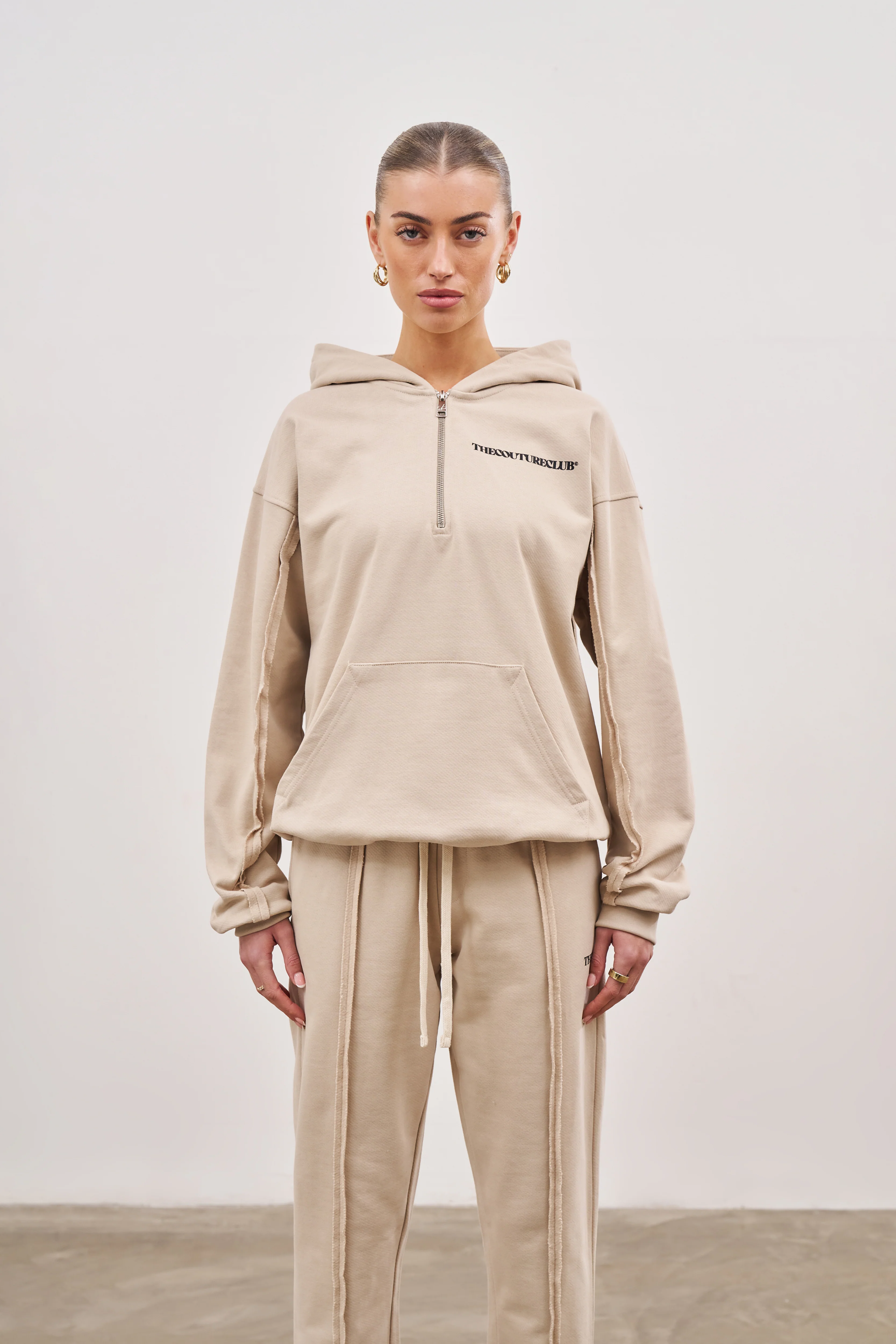 RAW SEAM QUARTER ZIP HOODIE - BEIGE