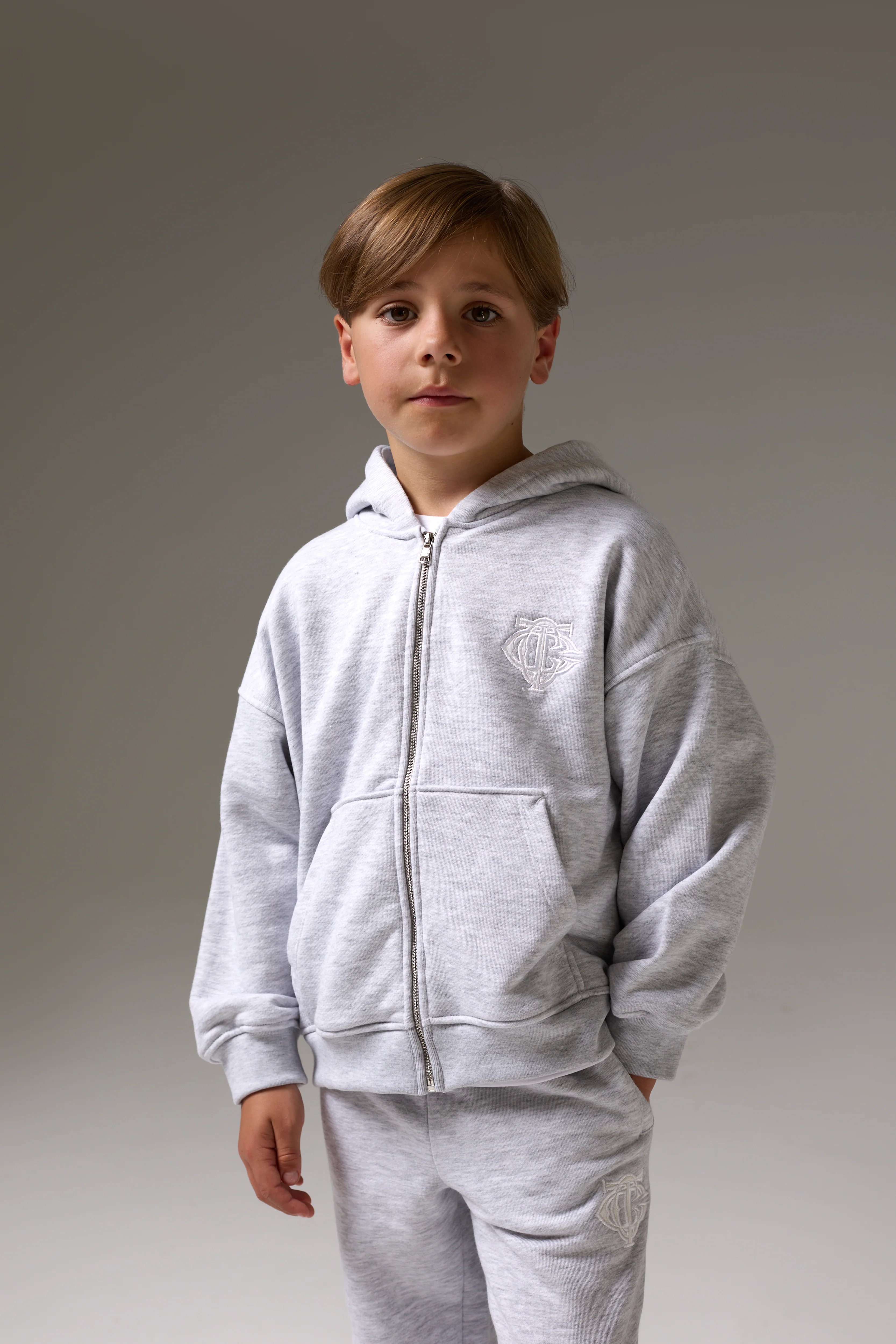 JUNIOR ZIP THROUGH MONOGRAM EMBLEM APPLIQUE HOODIE - GREY MARL