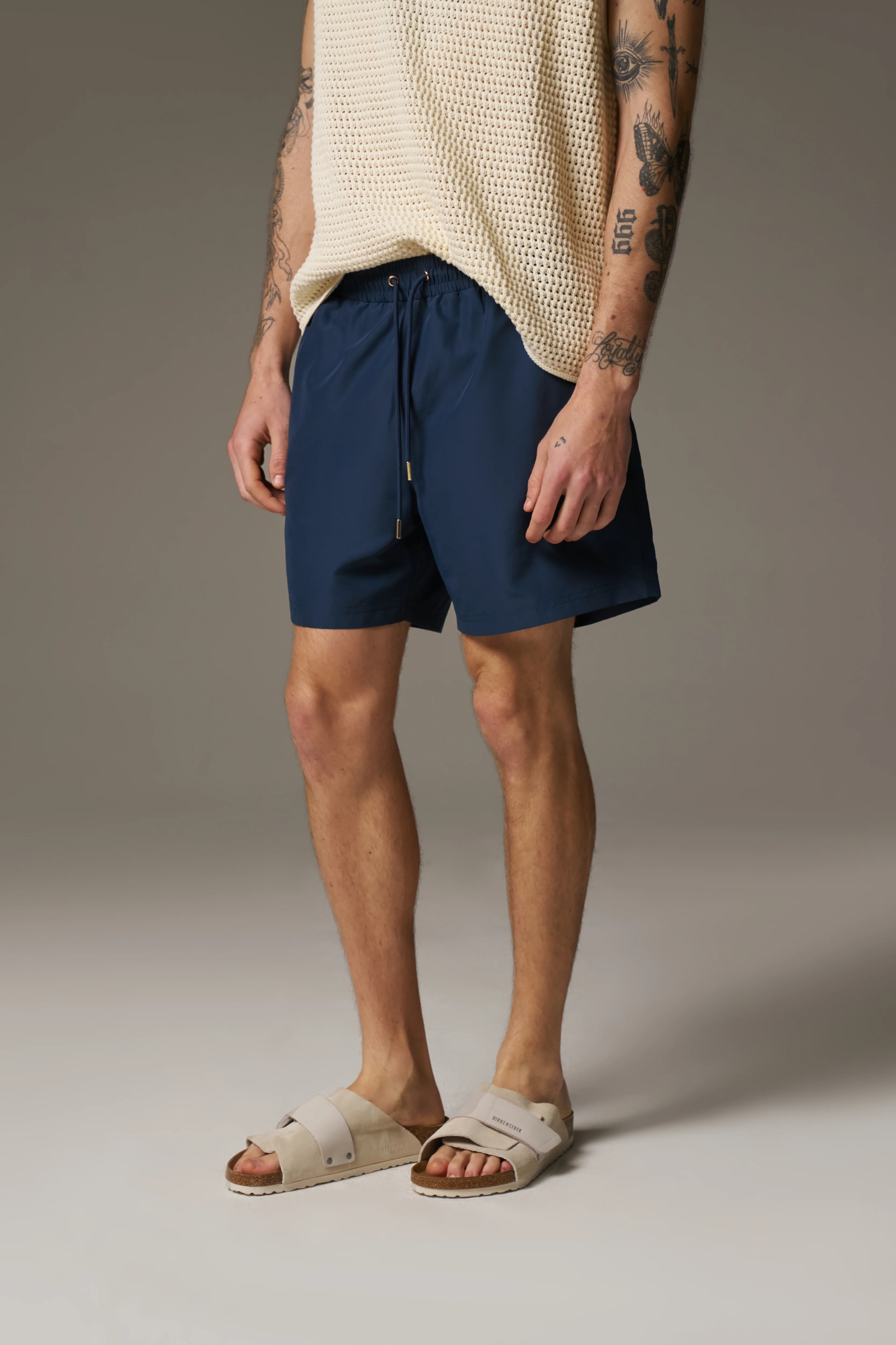 WATER REACTIVE EMBLEM SWIM SHORT - NAVY