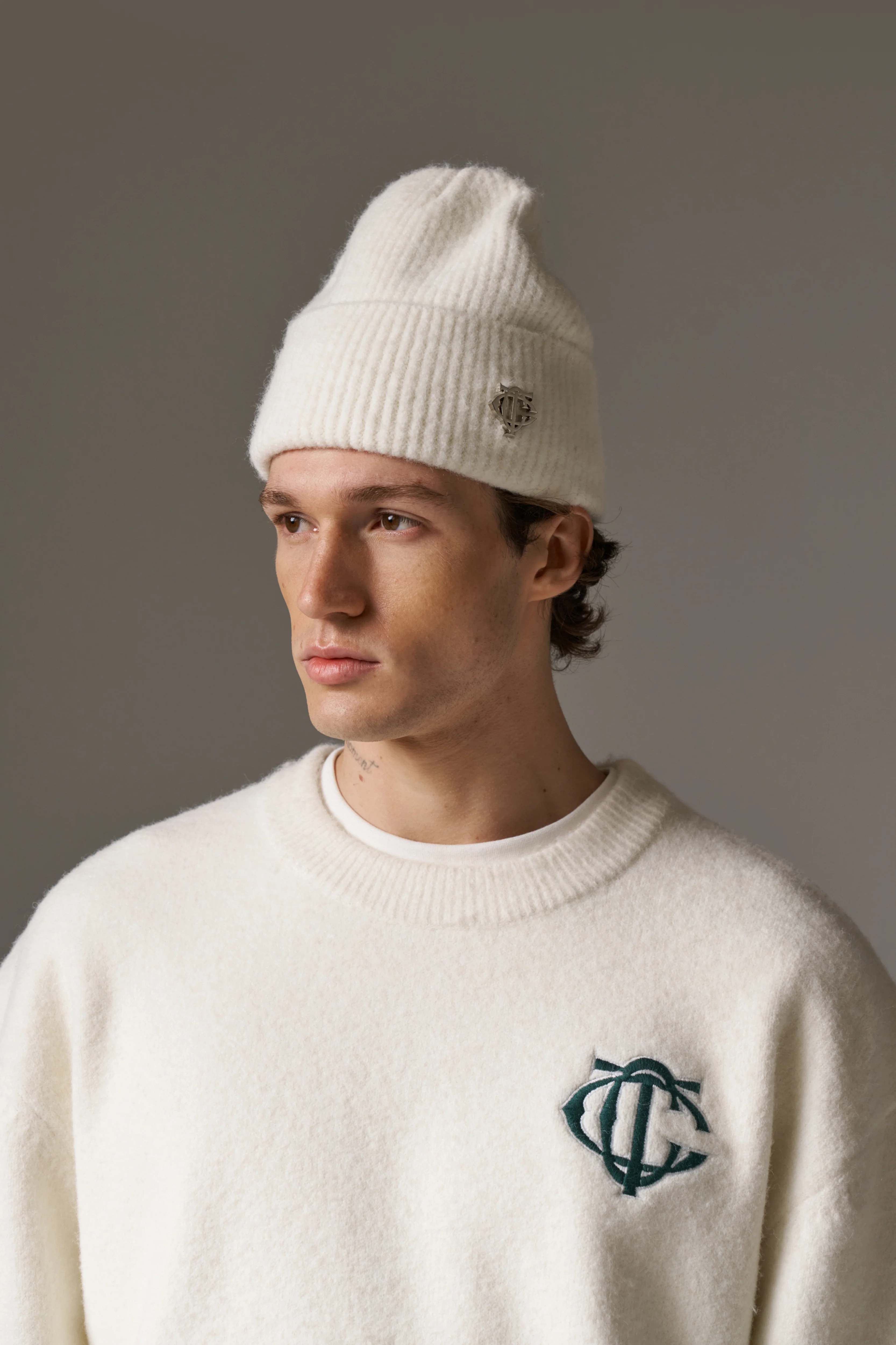 FLUFFY KNIT MONOGRAM PIN BADGE BEANIE - OFF WHITE