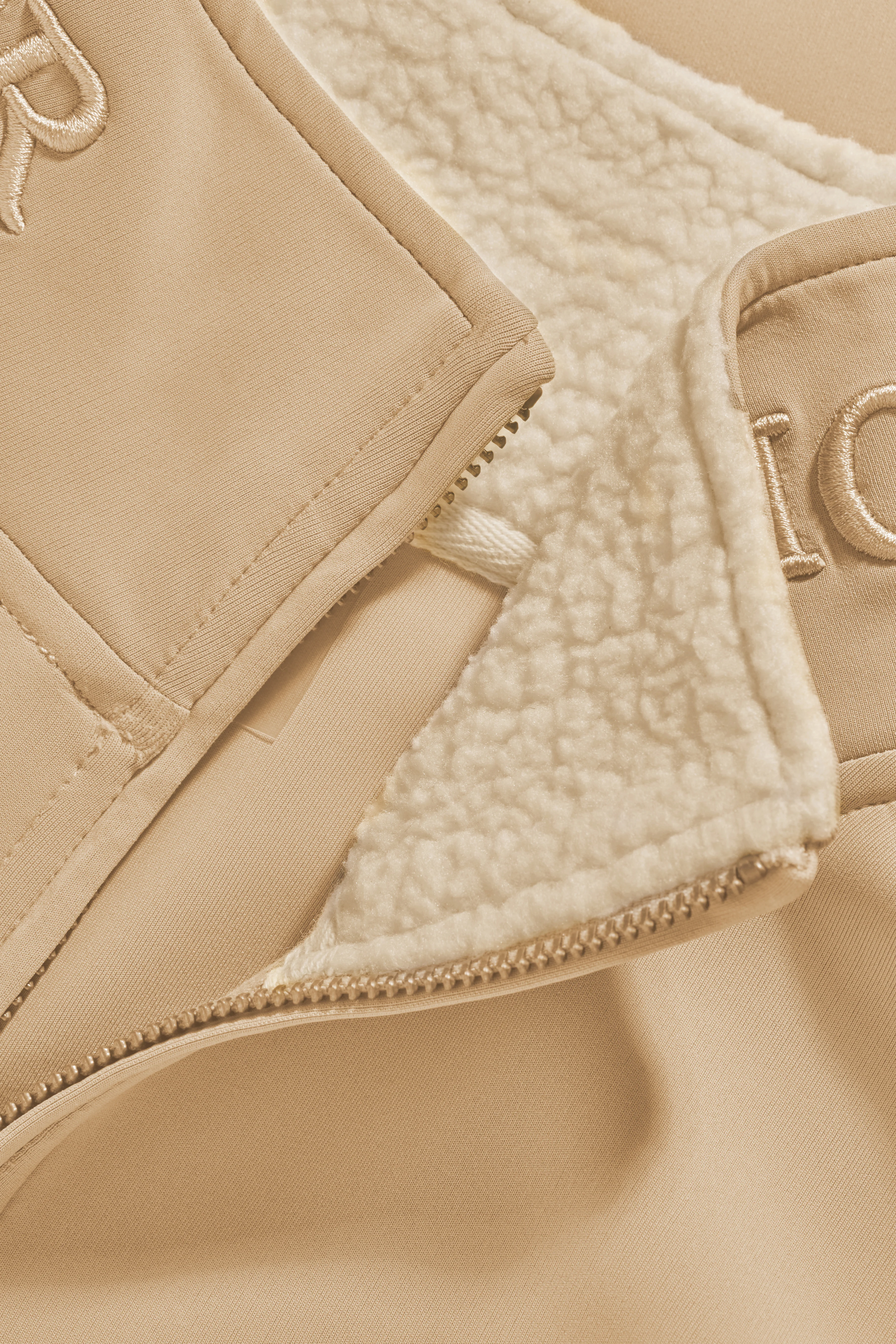 Training Zip Through Sweat (Stone)