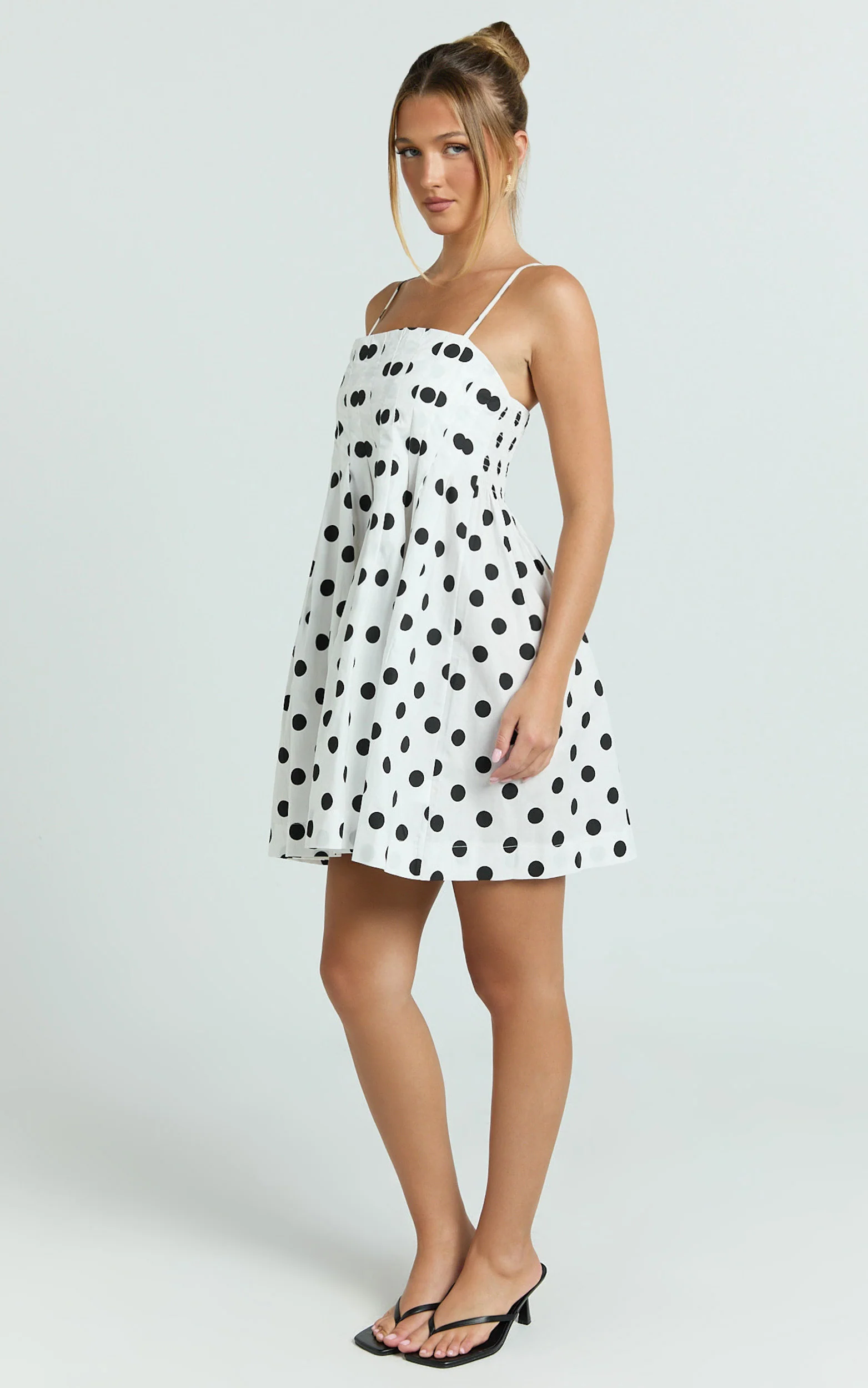 Sia Mini Dress - Sleeveless Straight Neck A Line Dress in White with Black spot