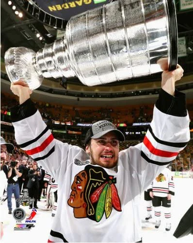 Marcus Kruger Chicago Blackhawks 2013 Stanley Cup Champions Raising Of The Cup Photo (Size: 8X10)