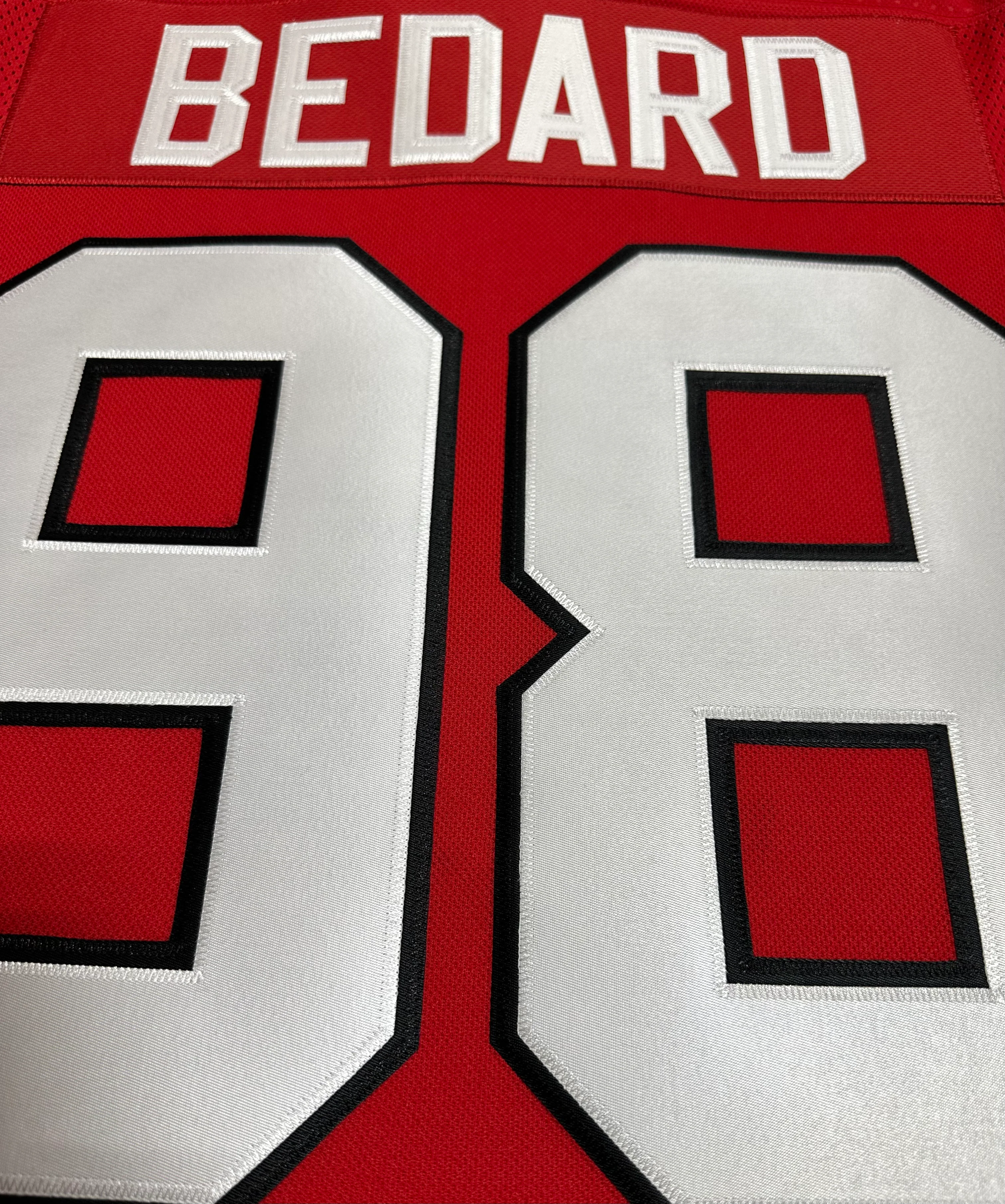 Men's Connor Bedard Chicago Blackhawks Red Home Fanatics Premium Twill Breakaway Replica Jersey