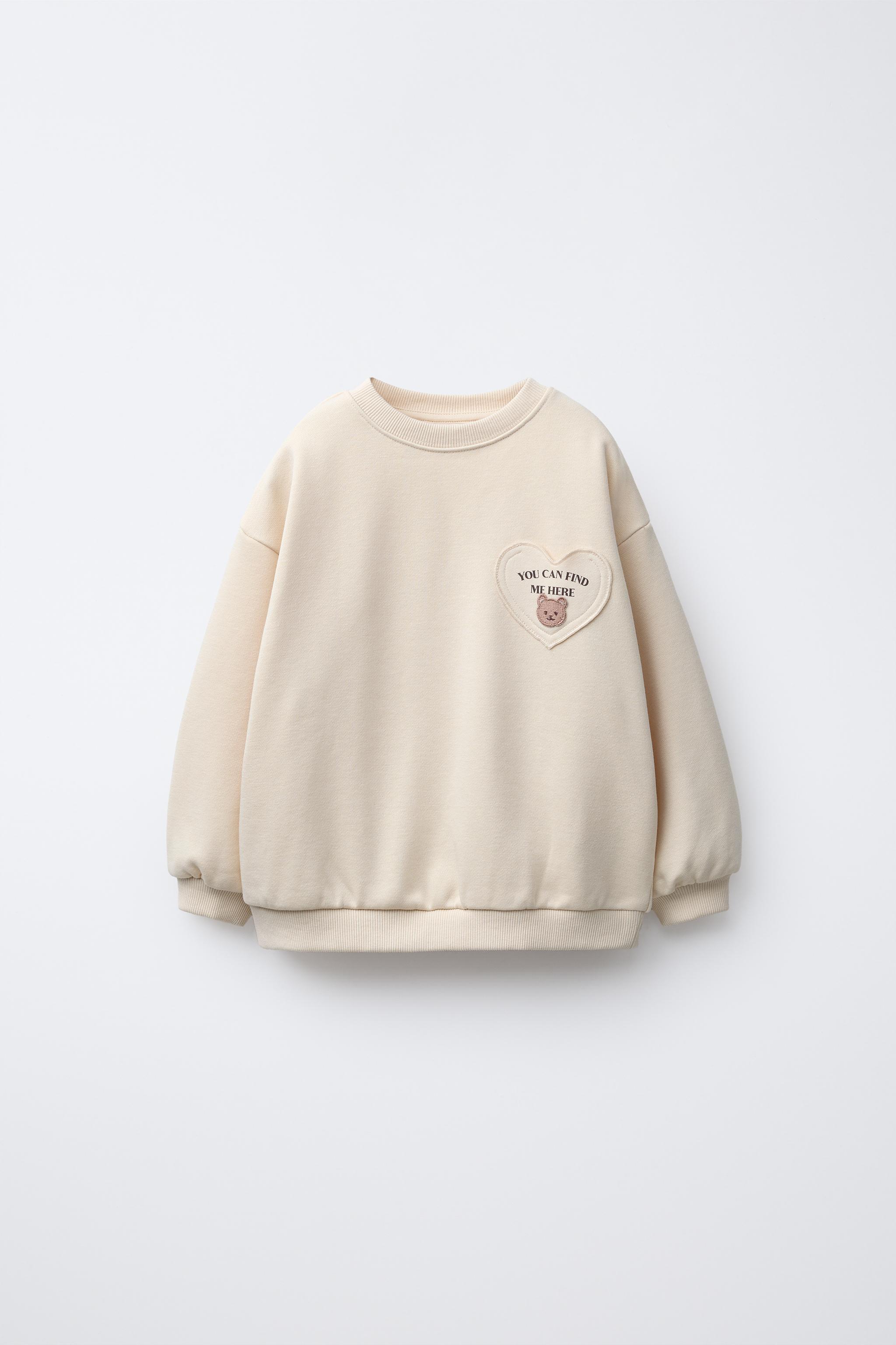 HEART POCKET SWEATSHIRT