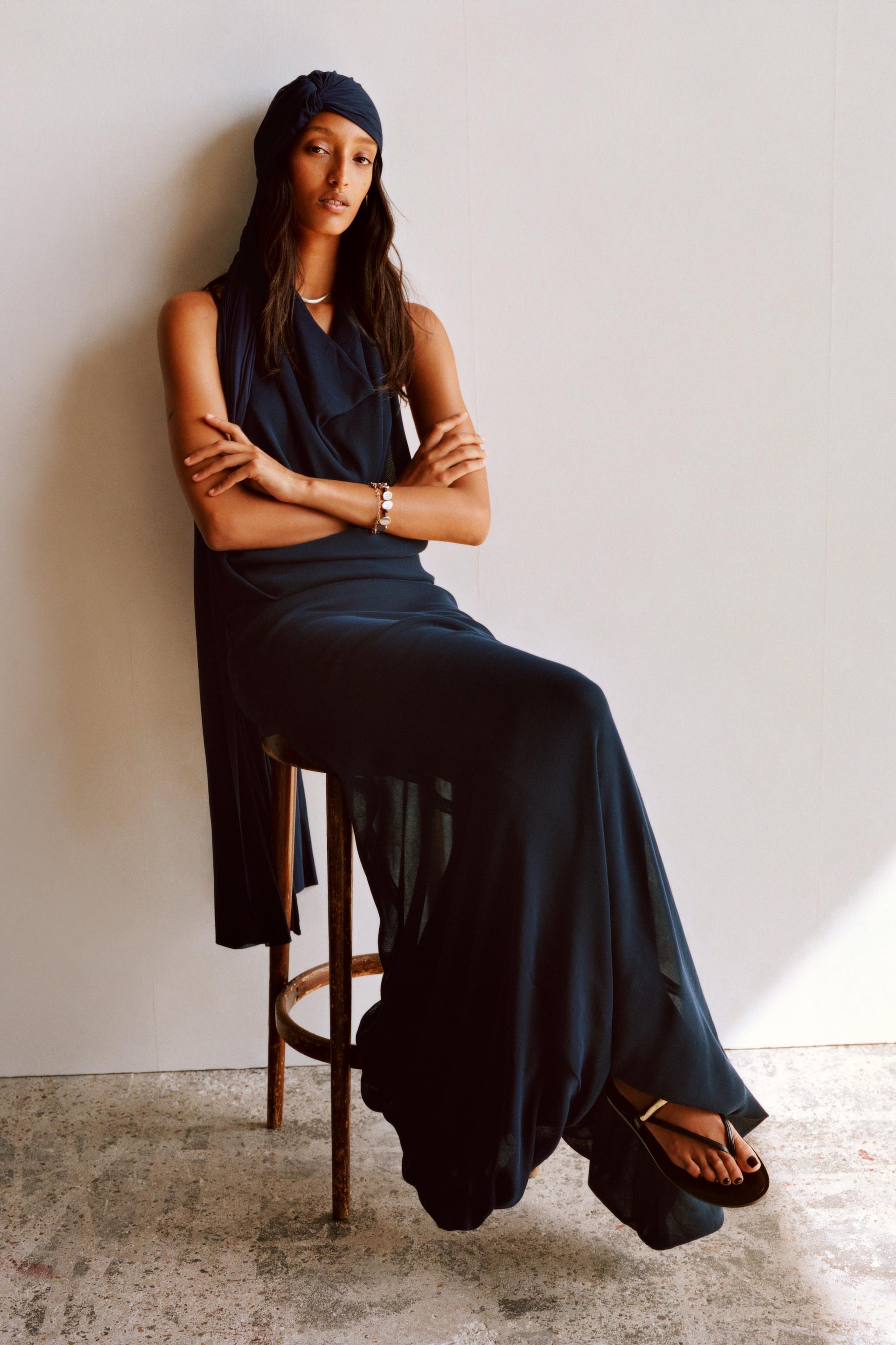 LIMITED EDITION HALTER DRESS WITH VOLUMINOUS HEM