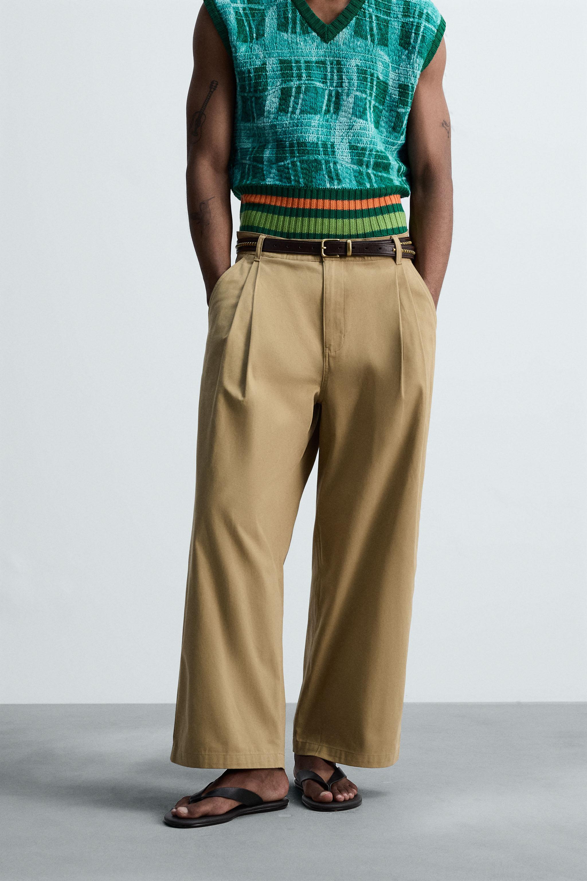 PLEATED WIDE FIT PANTS