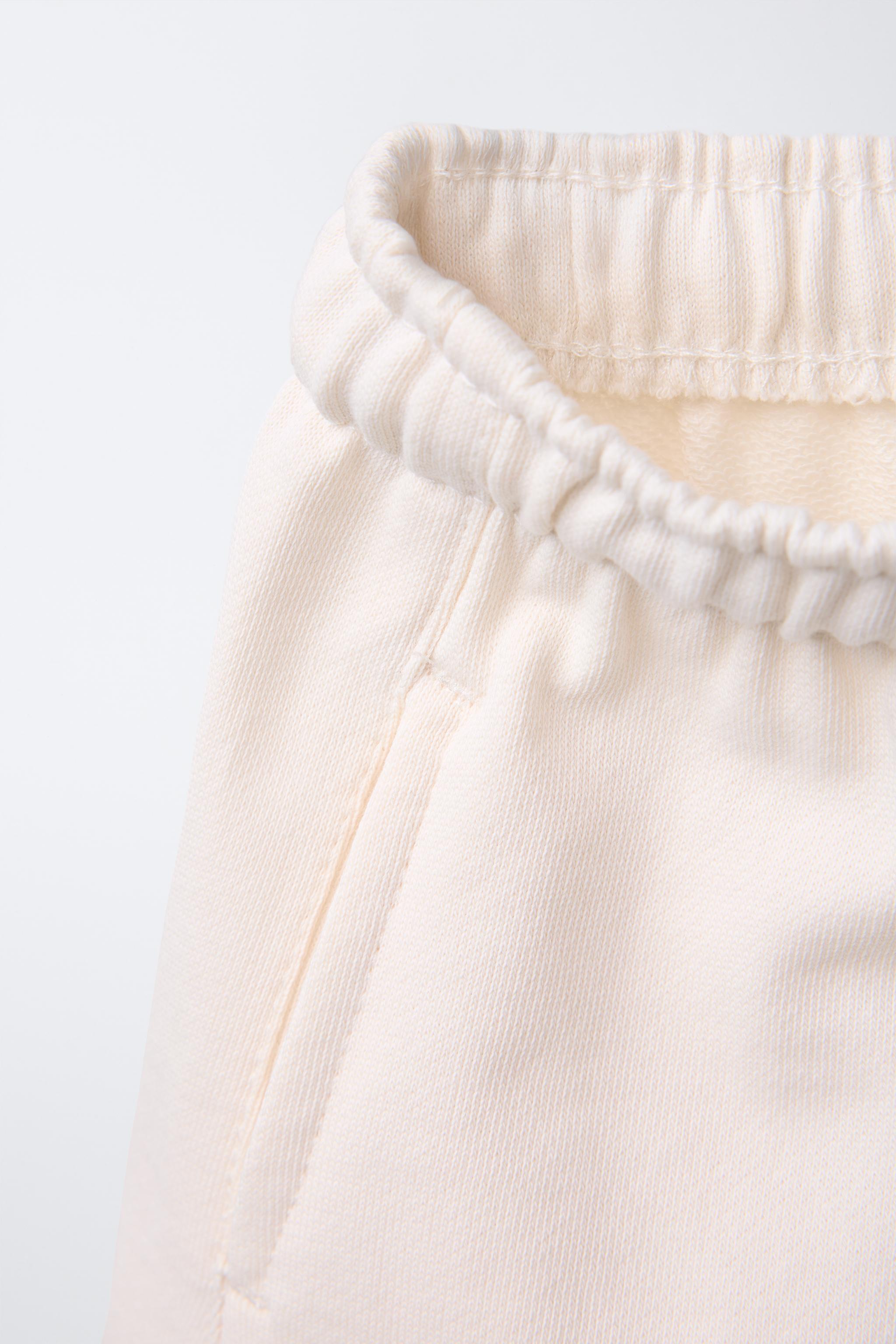 STRAIGHT TEXT PLUSH SHORTS