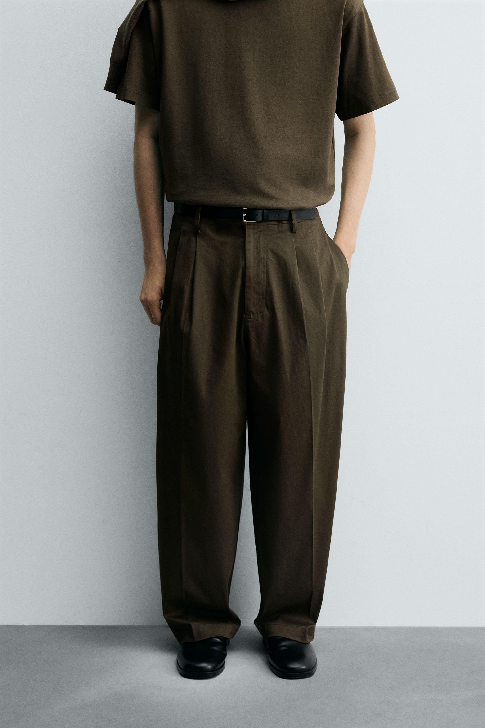 RELAXED FIT PLEATED PANTS