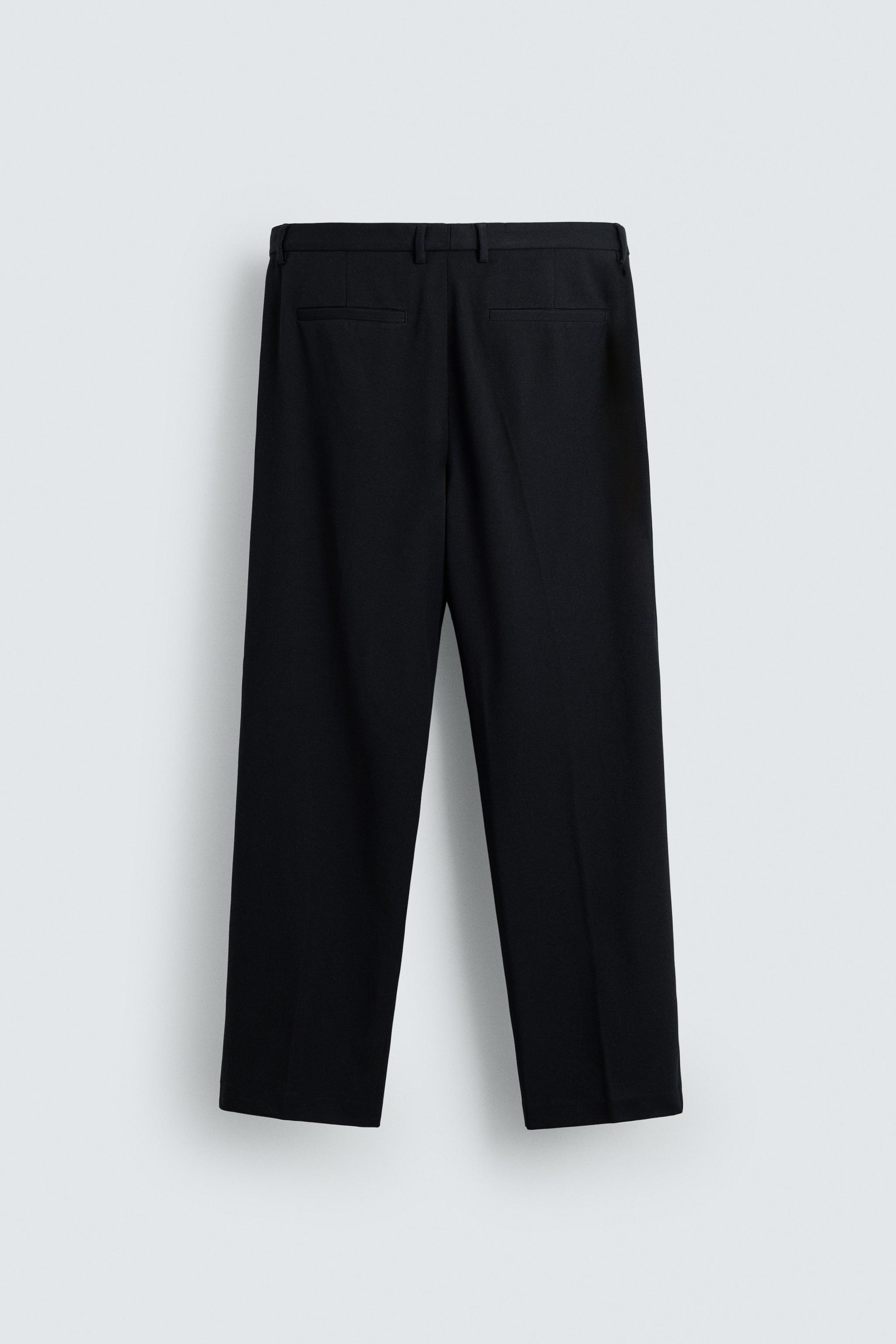 REGULAR FIT PLEATED PANTS