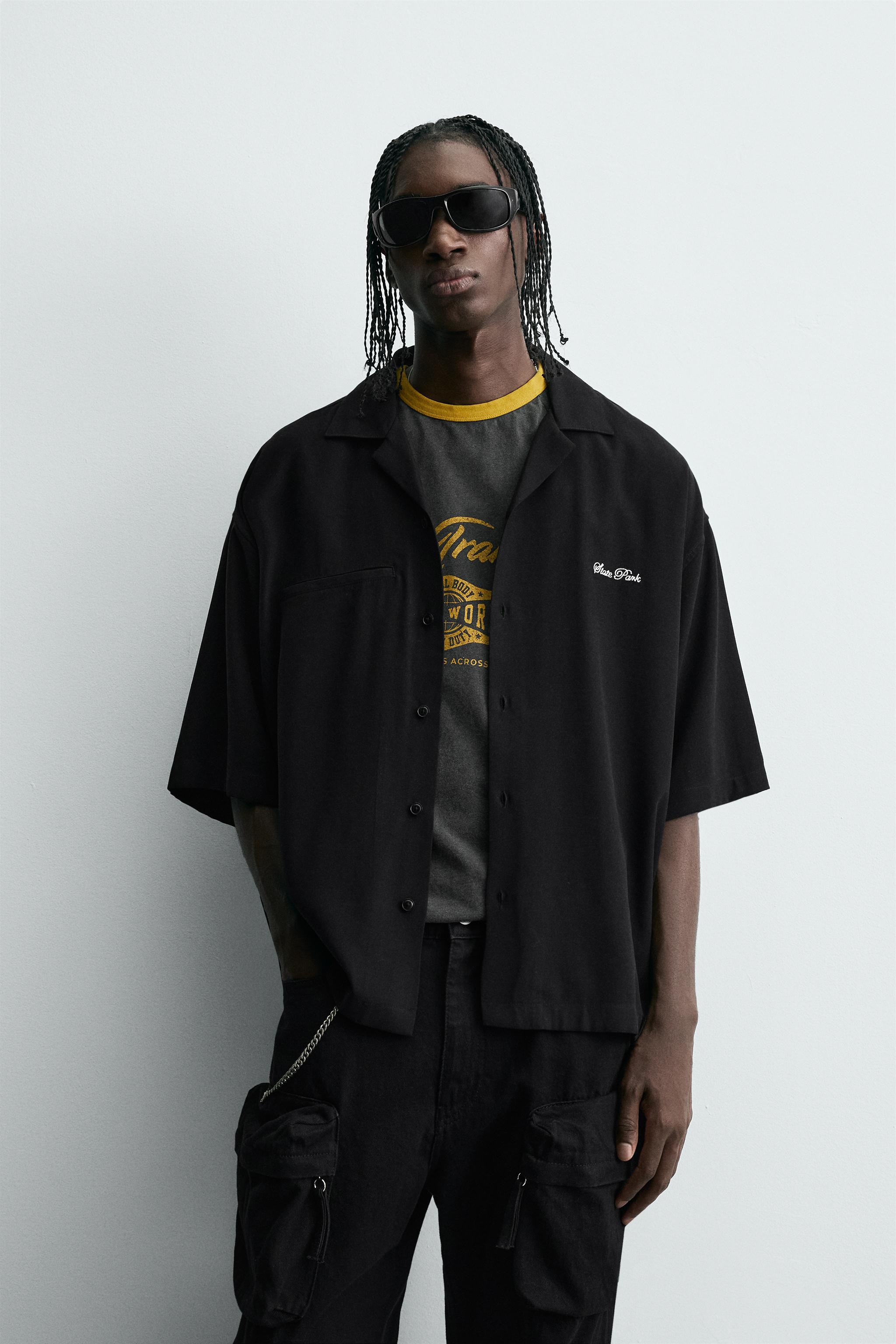 FLOWY SHIRT WITH EMBROIDERED TEXT