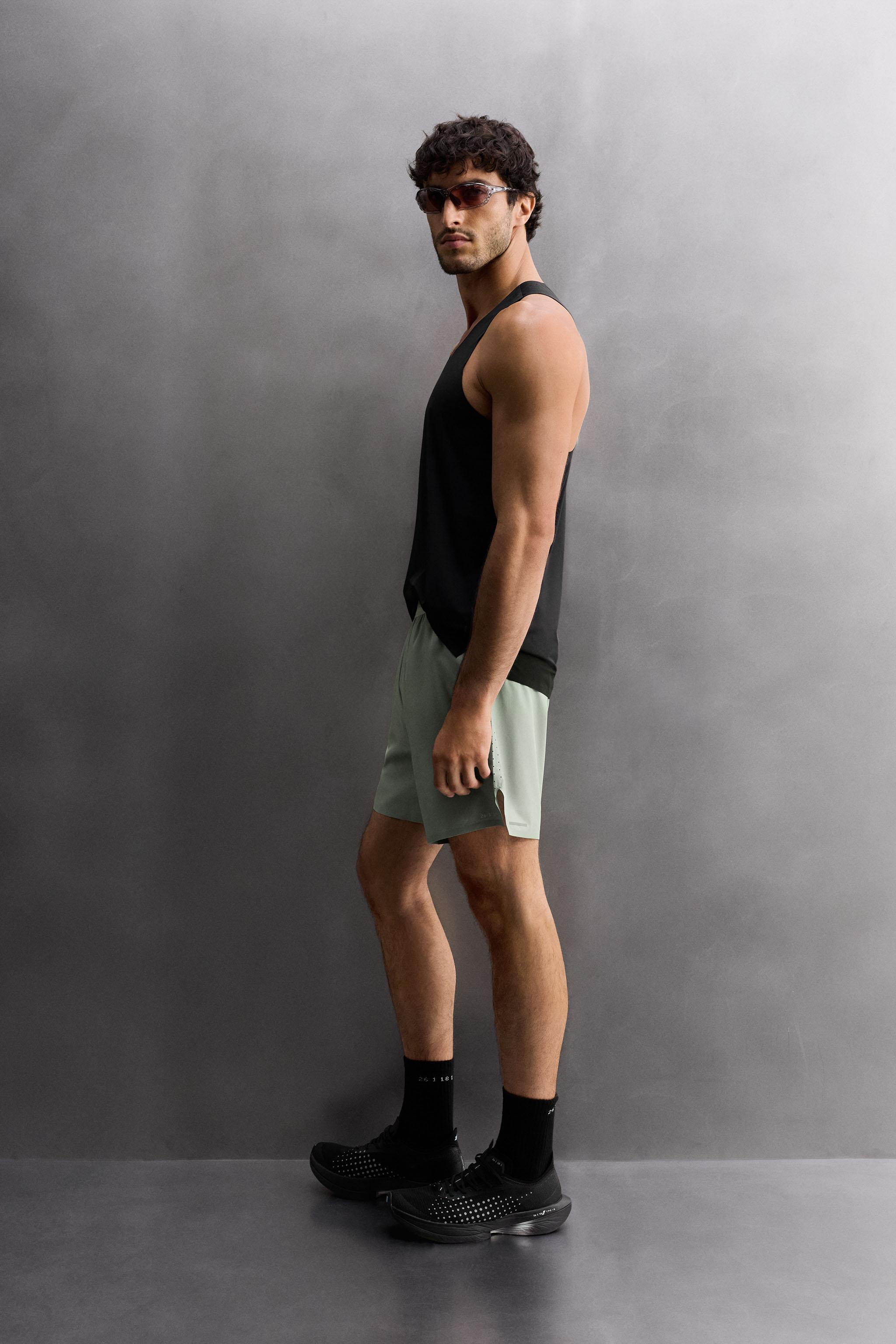 LIGHTWEIGHT PERFORATED SHORTS