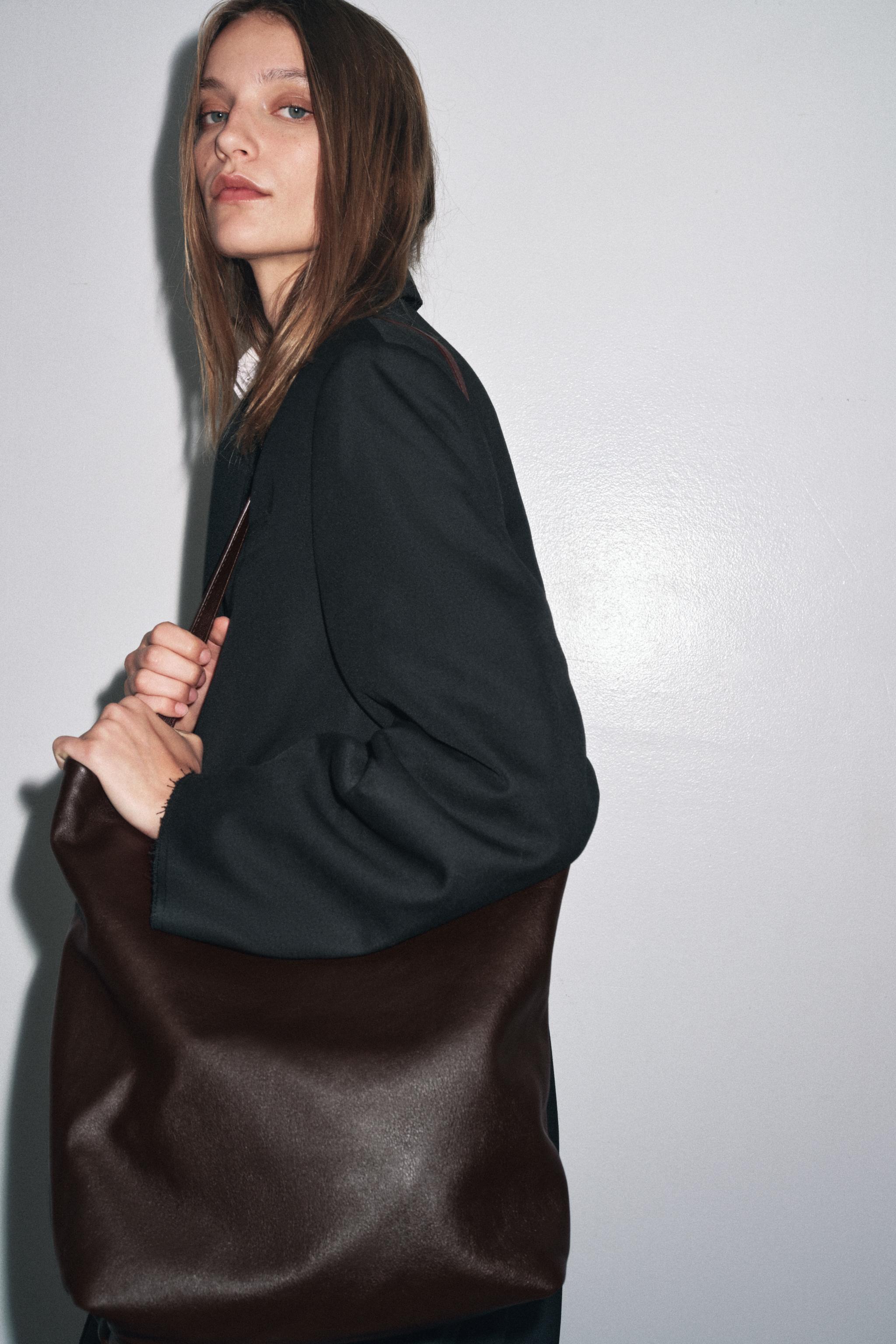 DOUBLE COMPARTMENT LEATHER BUCKET BAG