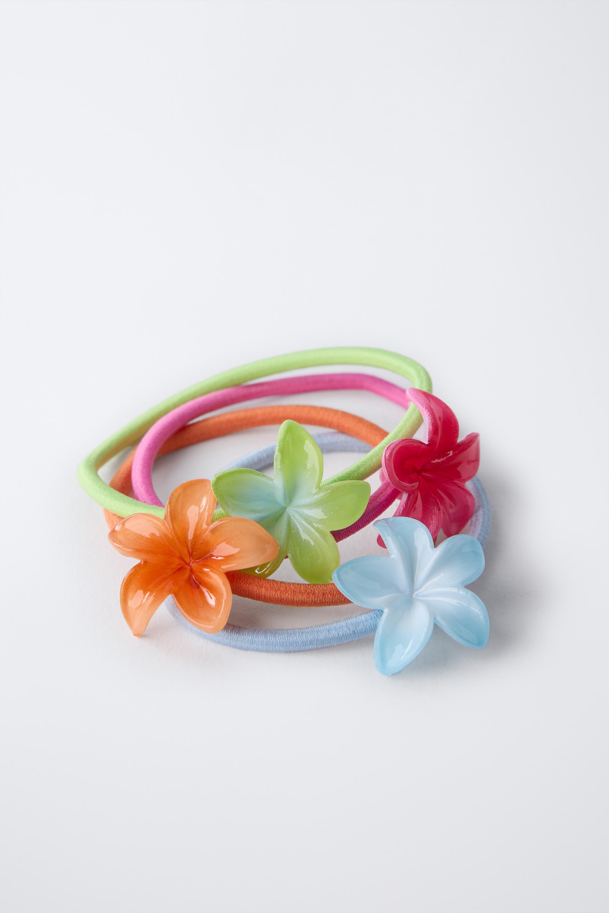 FOUR-PACK OF FLOWER HAIR TIES