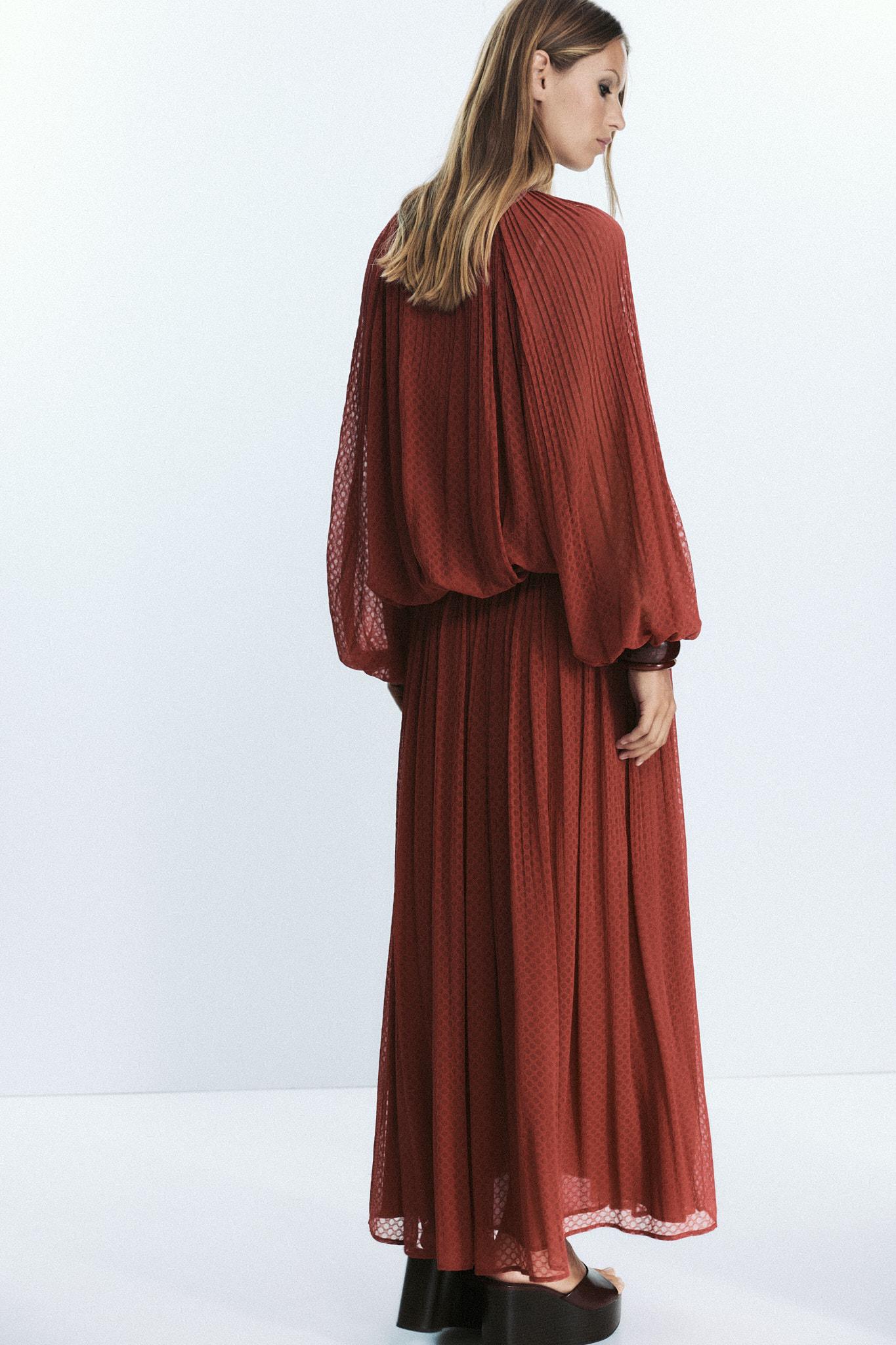 TASSEL PLEATED BLOUSE