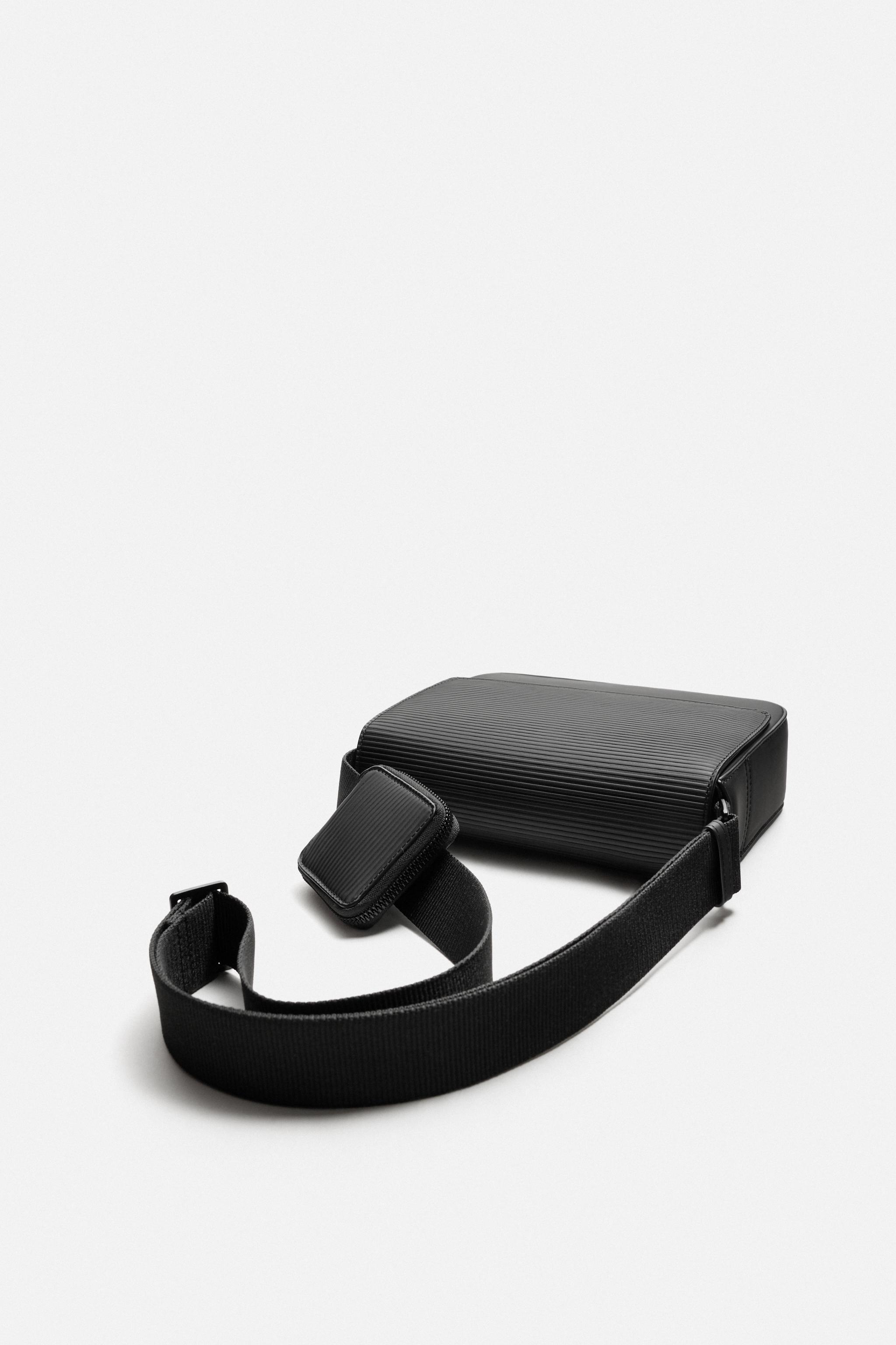 TEXTURED RUBBERIZED CROSSBODY BAG