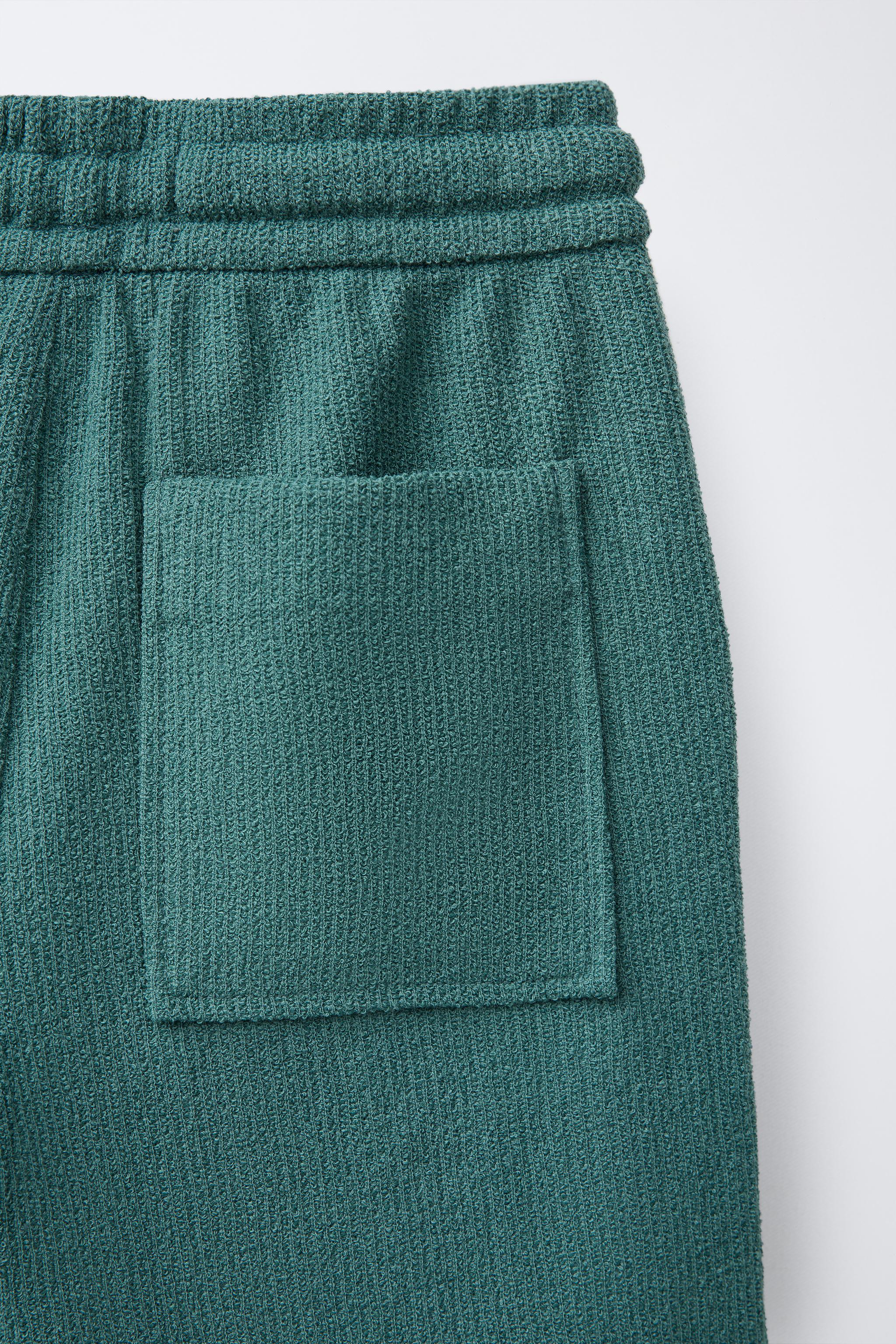 SLIM FIT TEXTURED TOWELING SHORTS