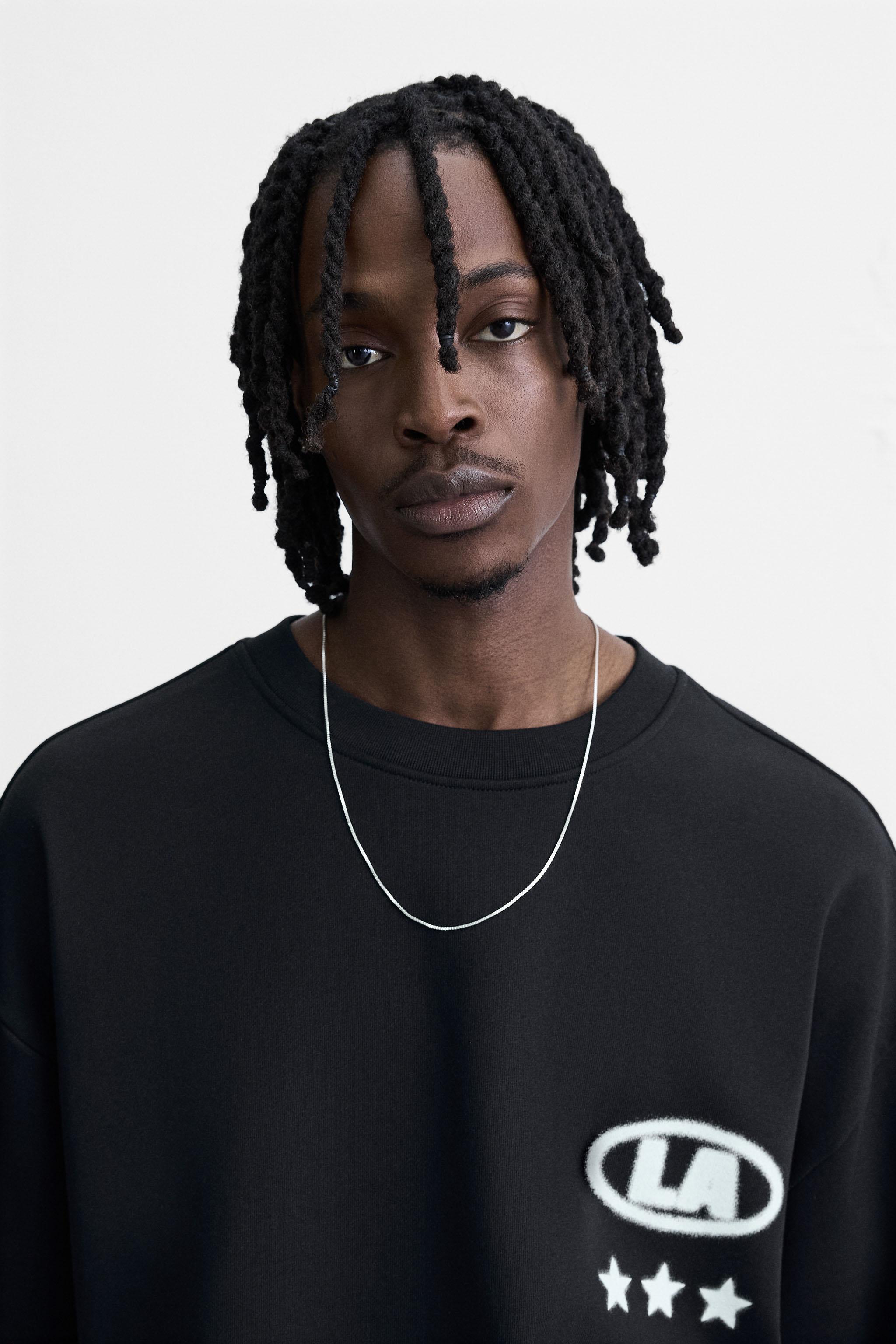 PRINTED GRAPHIC SWEATSHIRT