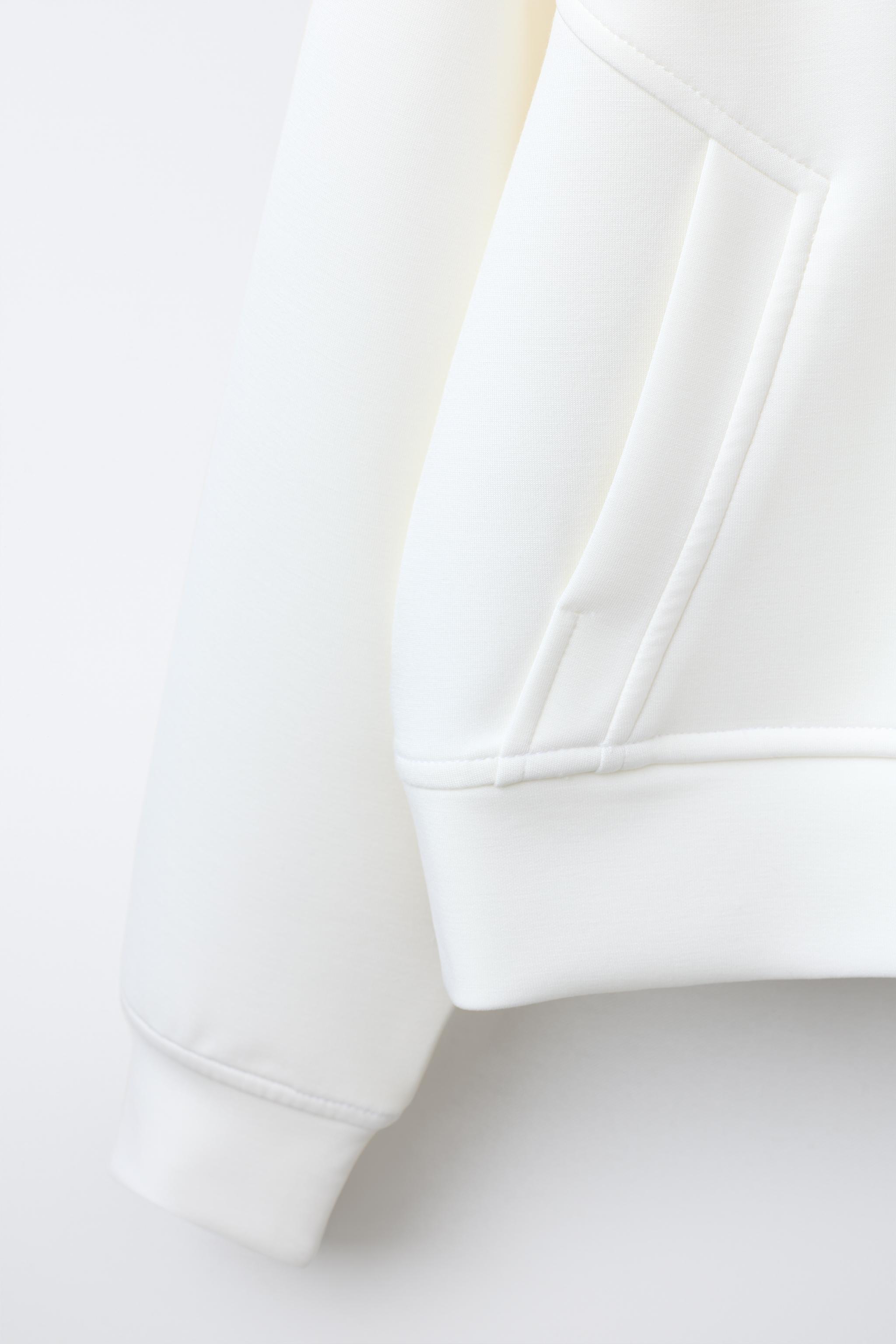 SWEATSHIRT WITH MODAL TEXT