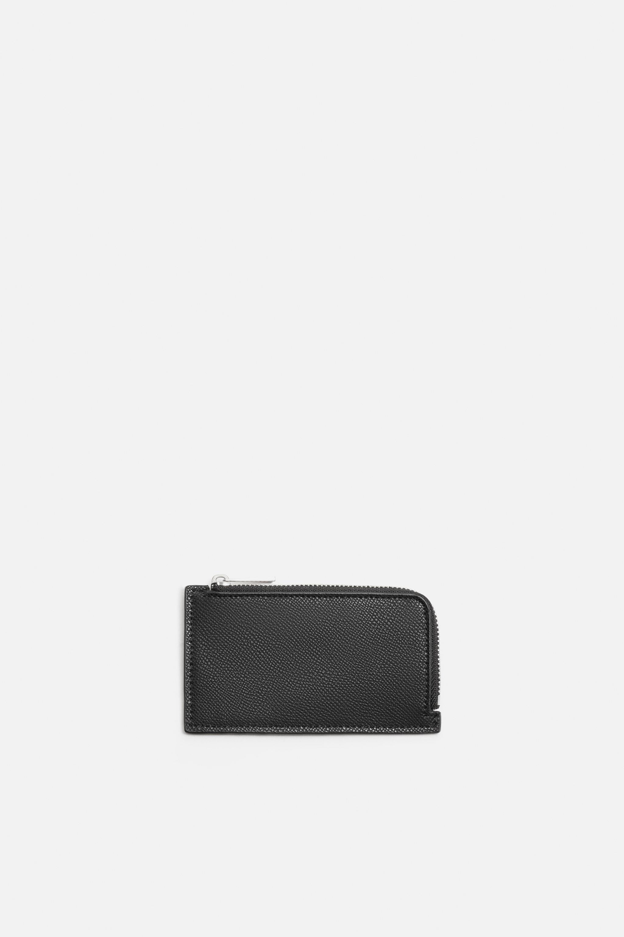 EMBOSSED CARDHOLDER