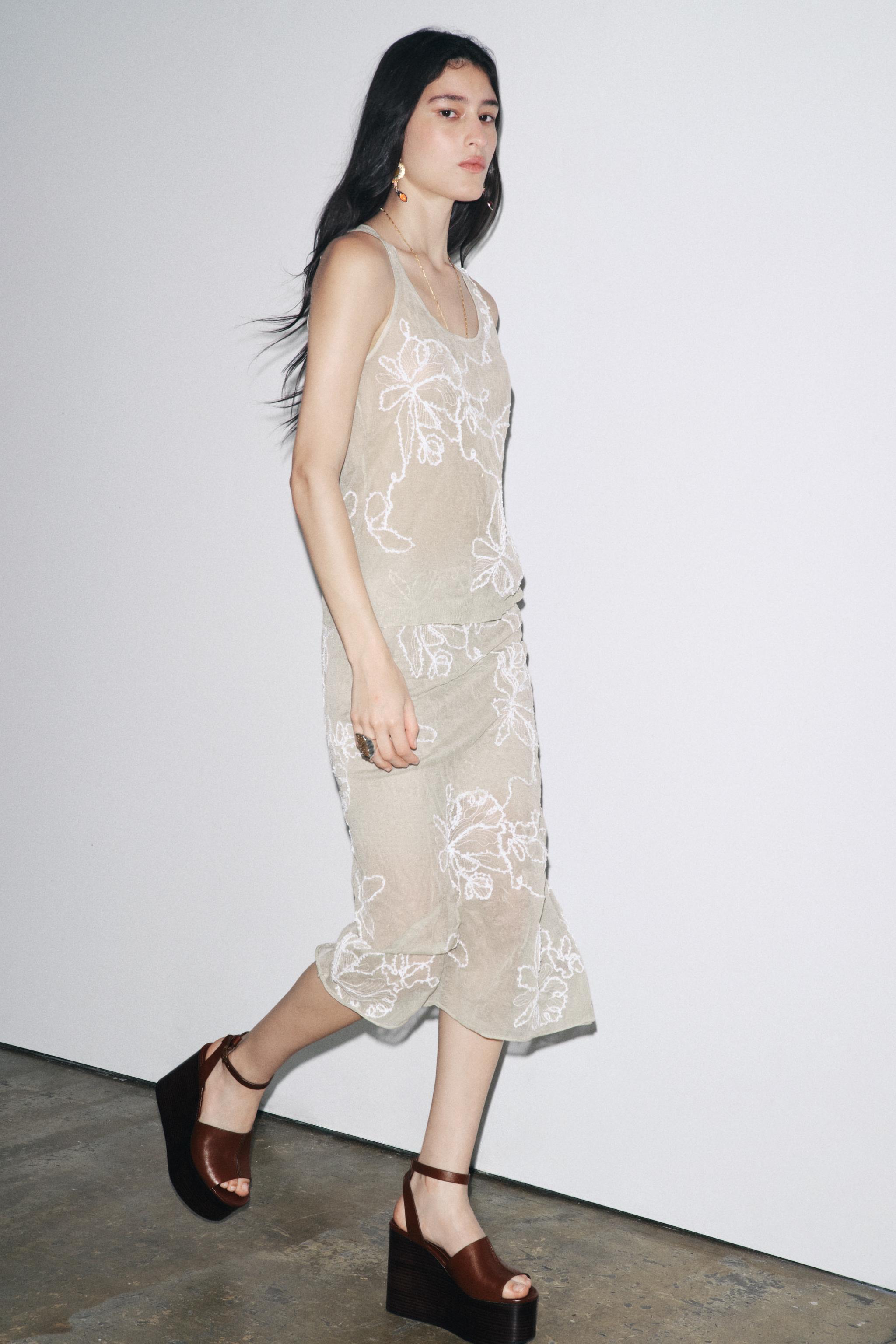 SEMI-SHEER STRUCTURED KNIT SKIRT