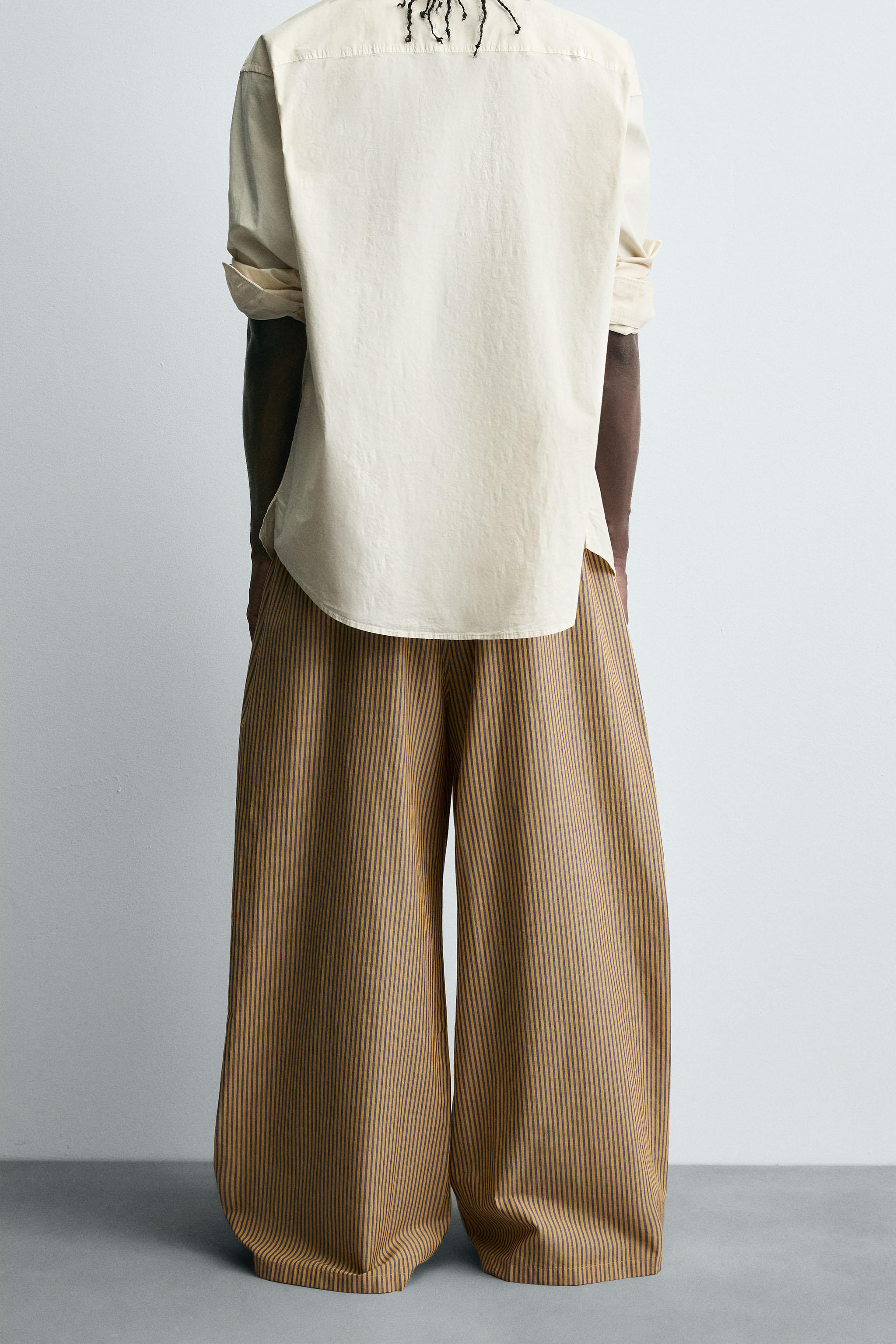 STRIPED OVERSIZED FIT PANTS