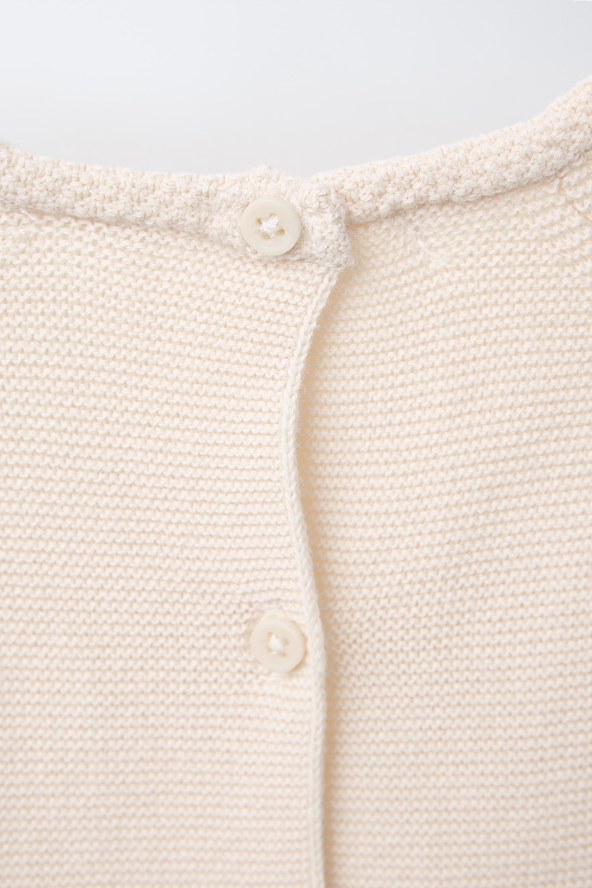 EMBROIDERED FLORAL LINKS KNIT SWEATER