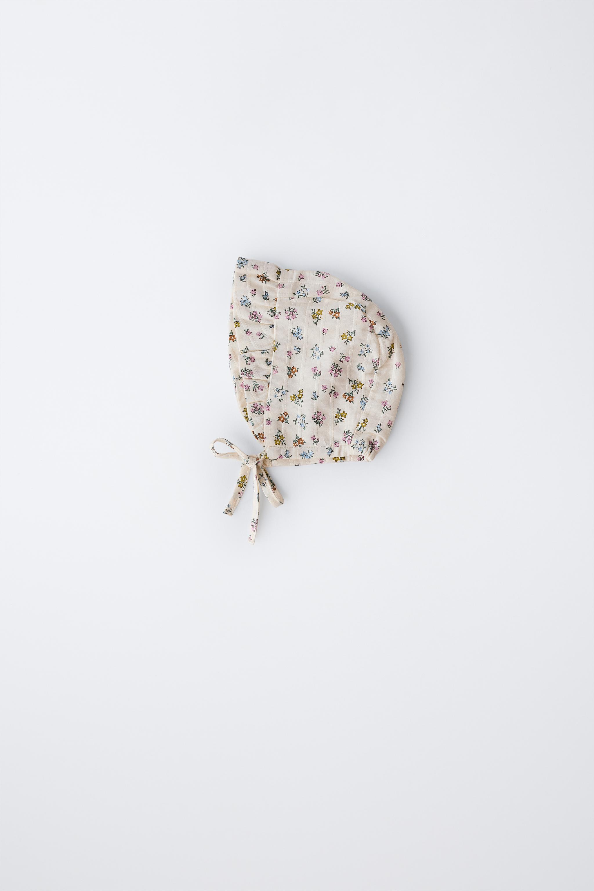 FLORAL TEXTURED RUFFLED BONNET