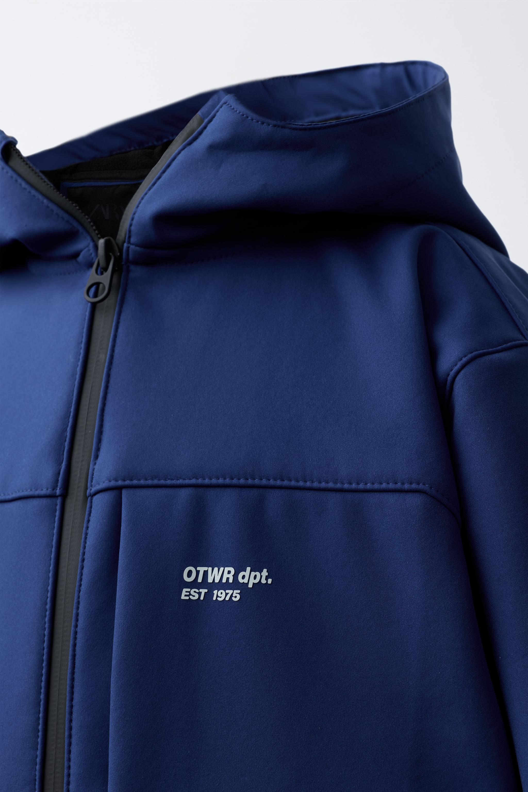 HOODED TECHNICAL JACKET