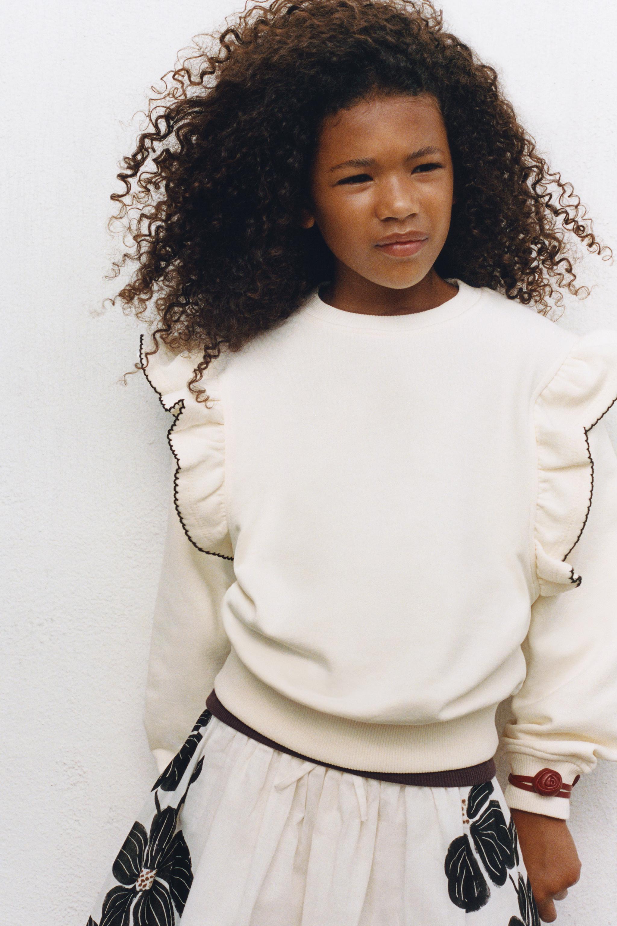 TOPSTITCHED RUFFLED SWEATSHIRT