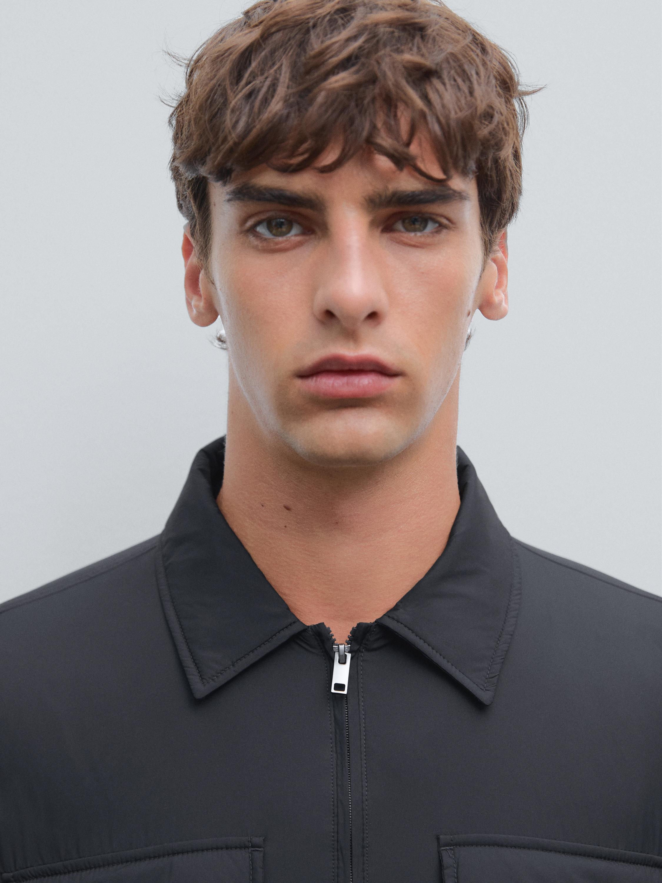 Water-repellent ultra lightweight down blend jacket