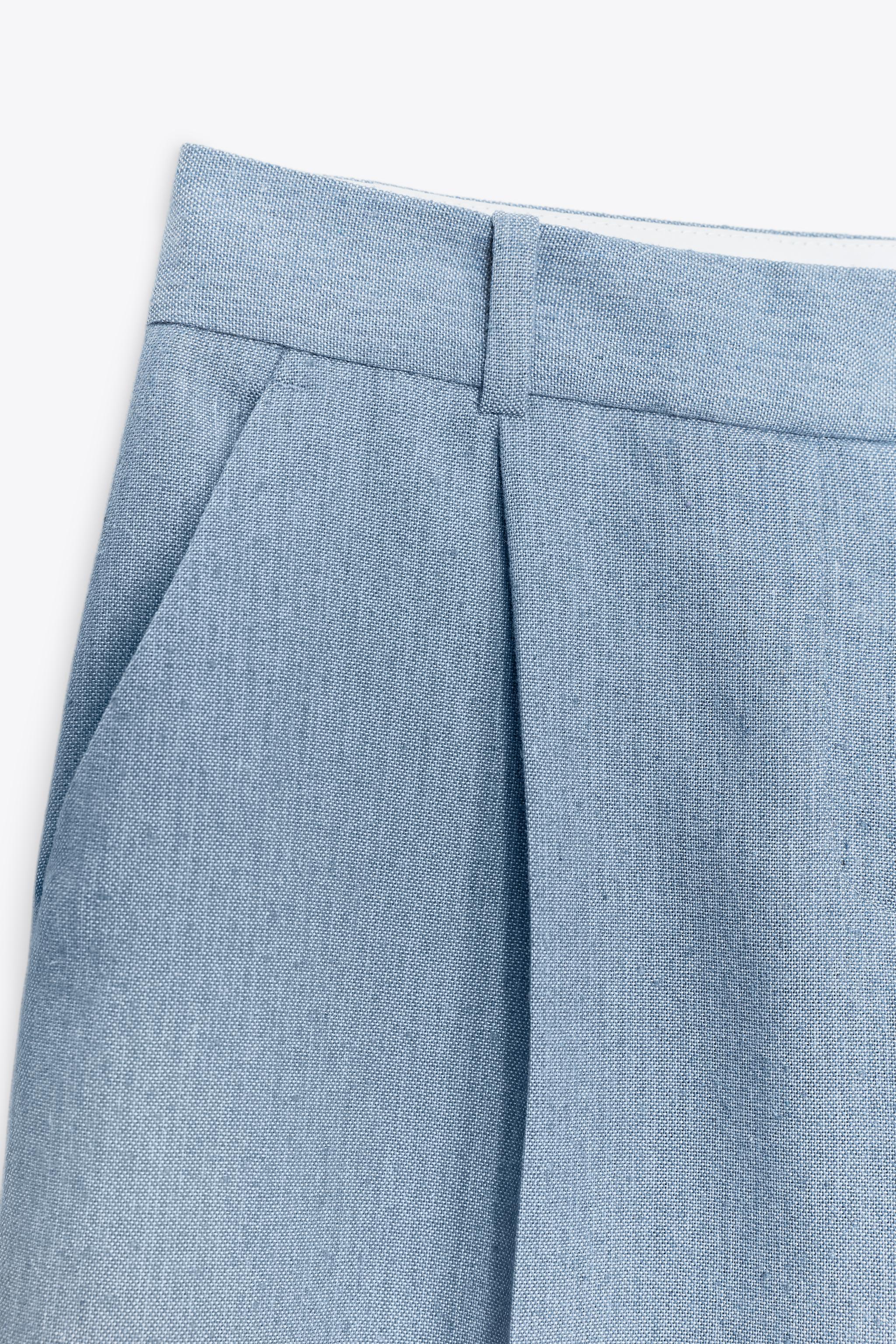 PLEATED STRAIGHT LEG PANTS