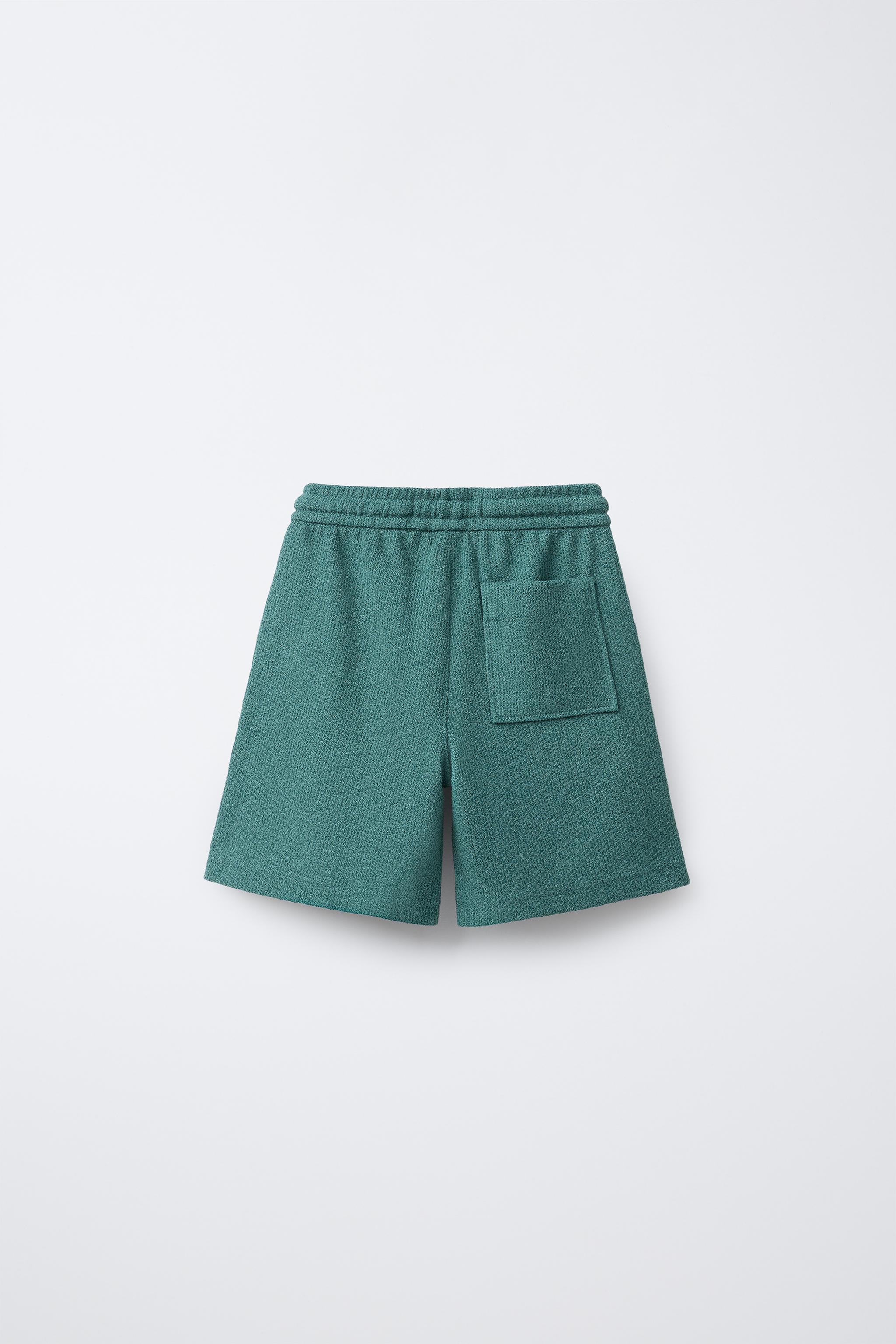 SLIM FIT TEXTURED TOWELING SHORTS