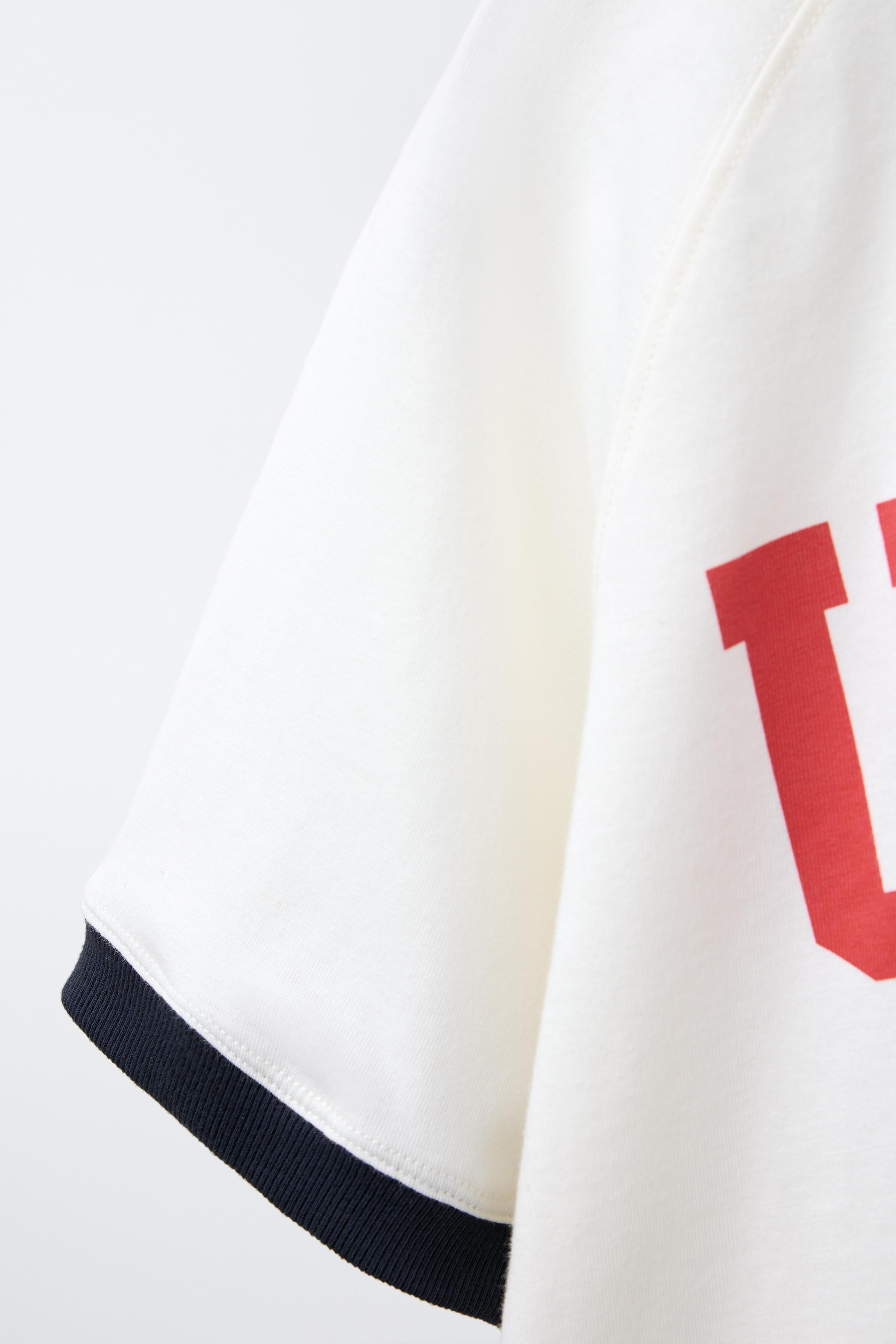 TEXT PRINT T-SHIRT WITH TRIM DETAIL