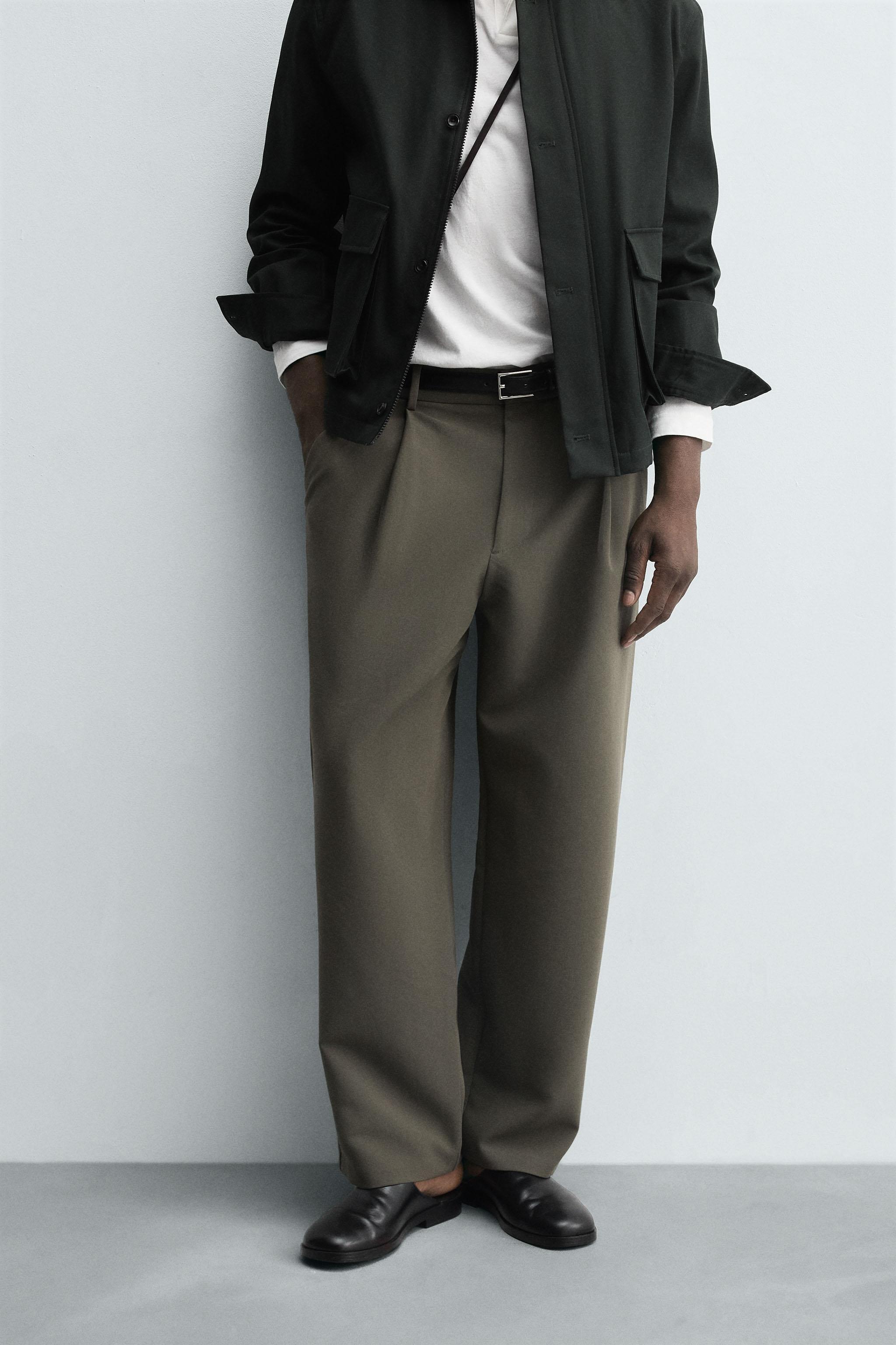 RELAXED FIT PLEATED PANTS