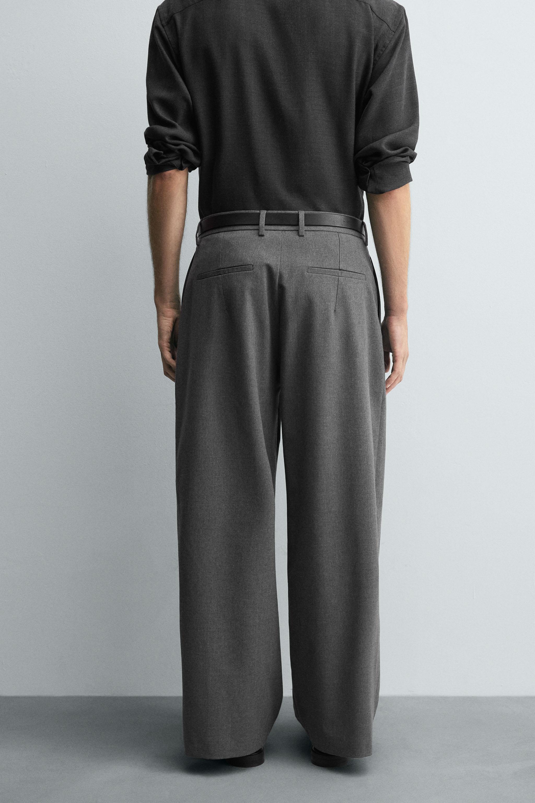 PLEATED WIDE FIT PANTS