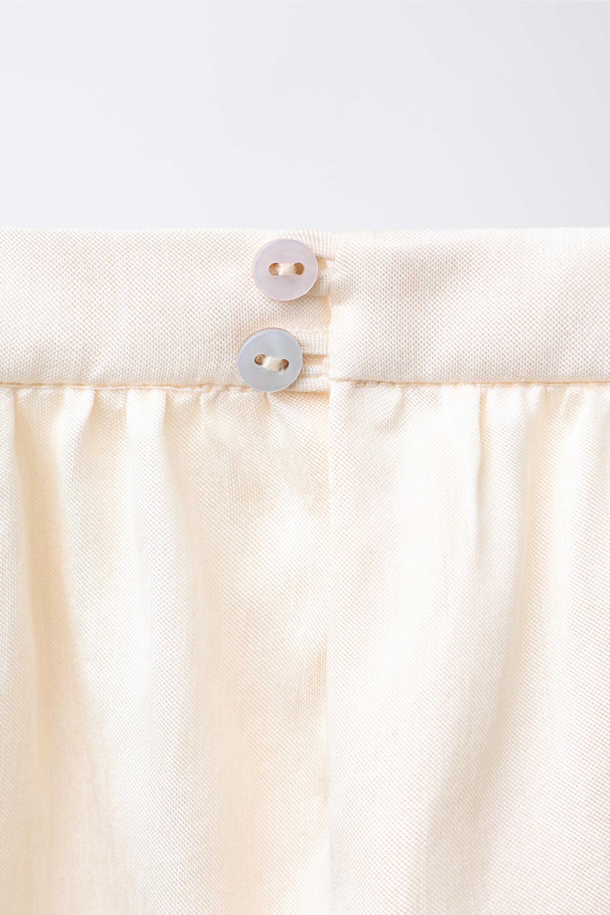 SATIN DRESS WITH BOWS