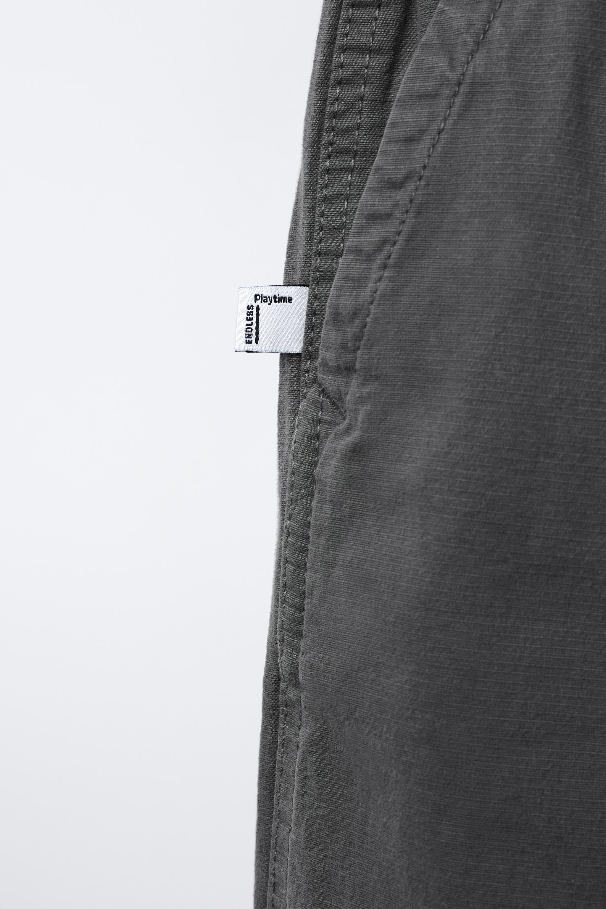 TEXTURED STRETCH PANTS