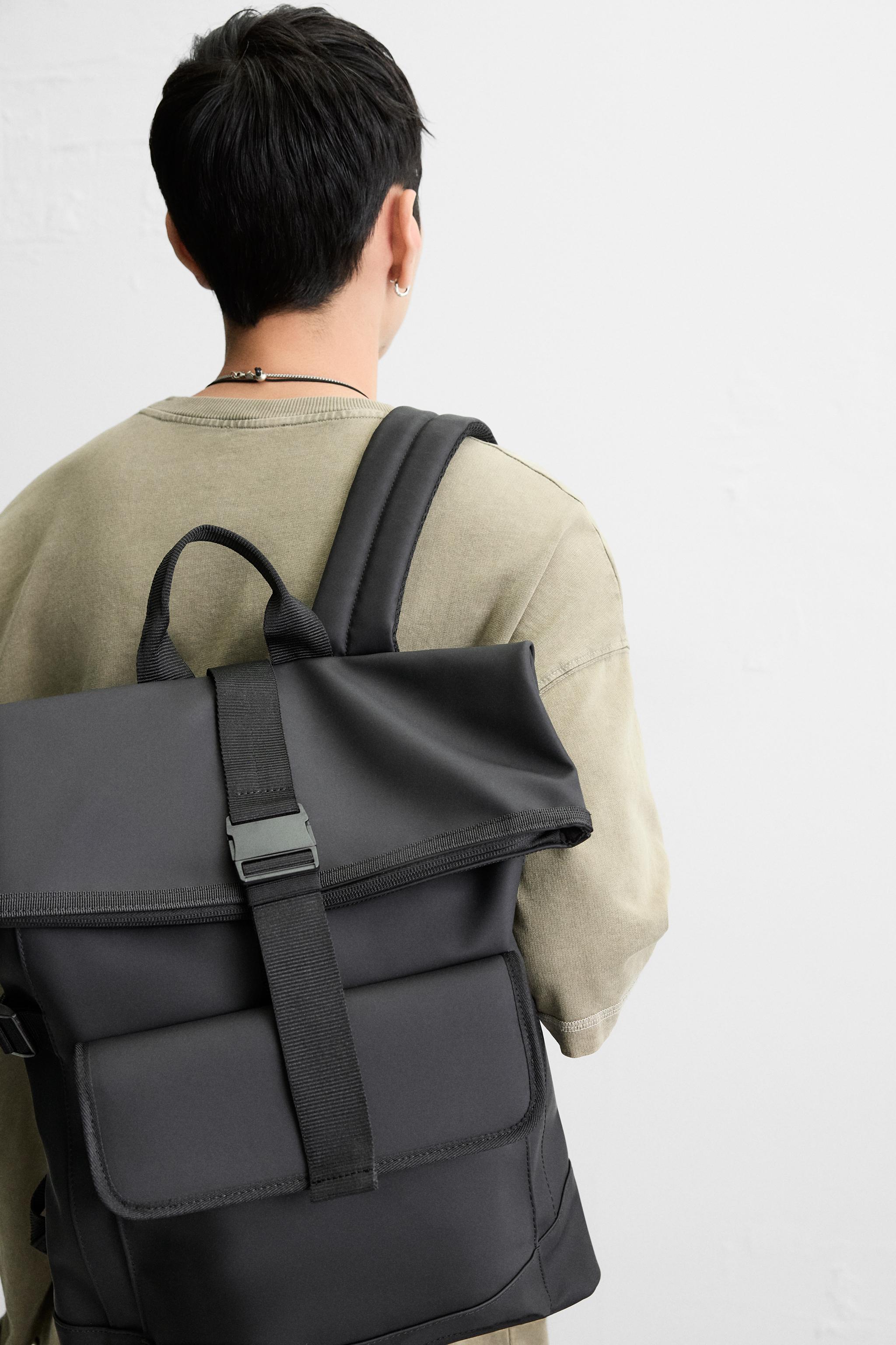 RUBBERIZED FLAP BACKPACK